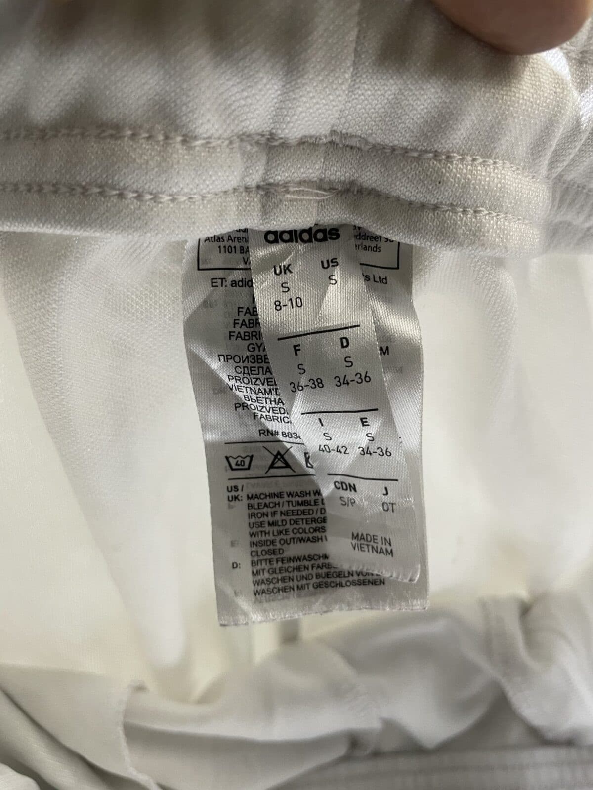 Adidas thrift track pants India close-up