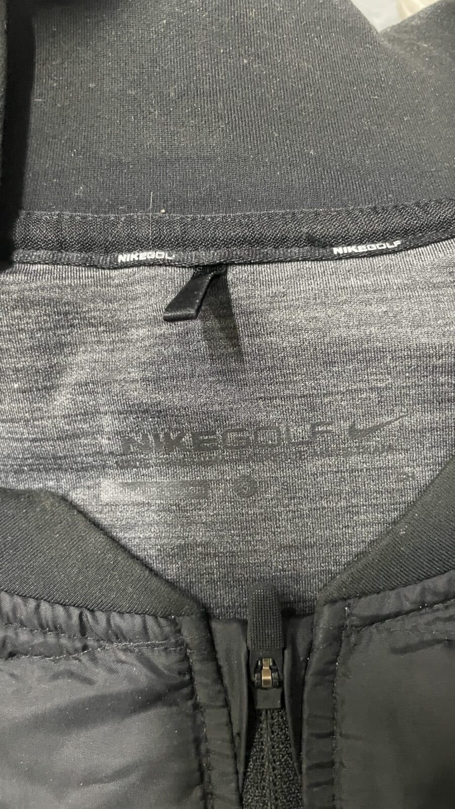 Nike thrift puffer jacket India close-up