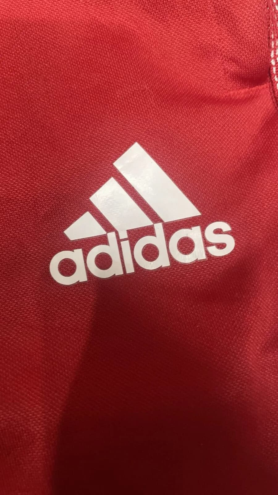 Adidas thrift track pants India close-up