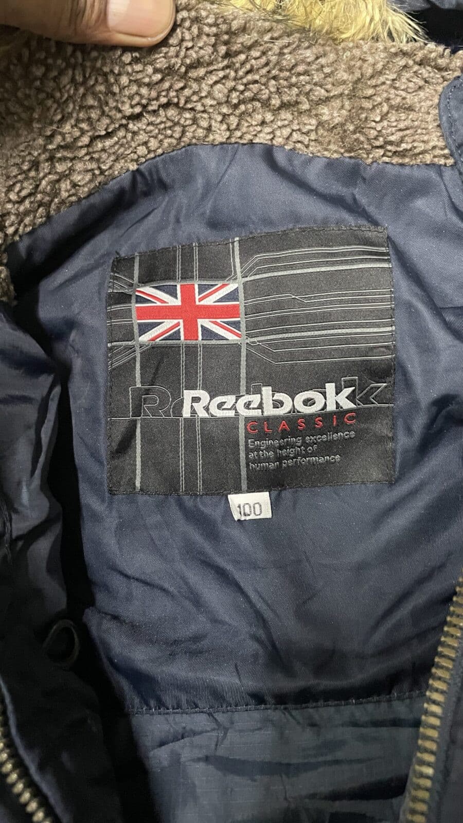 Reebok thrift jacket India close-up