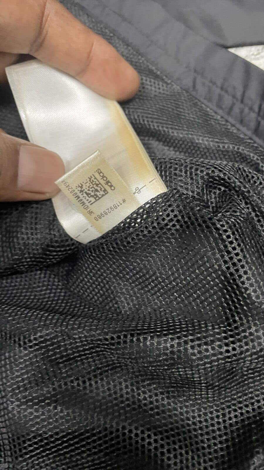 Adidas thrift jacket India close-up