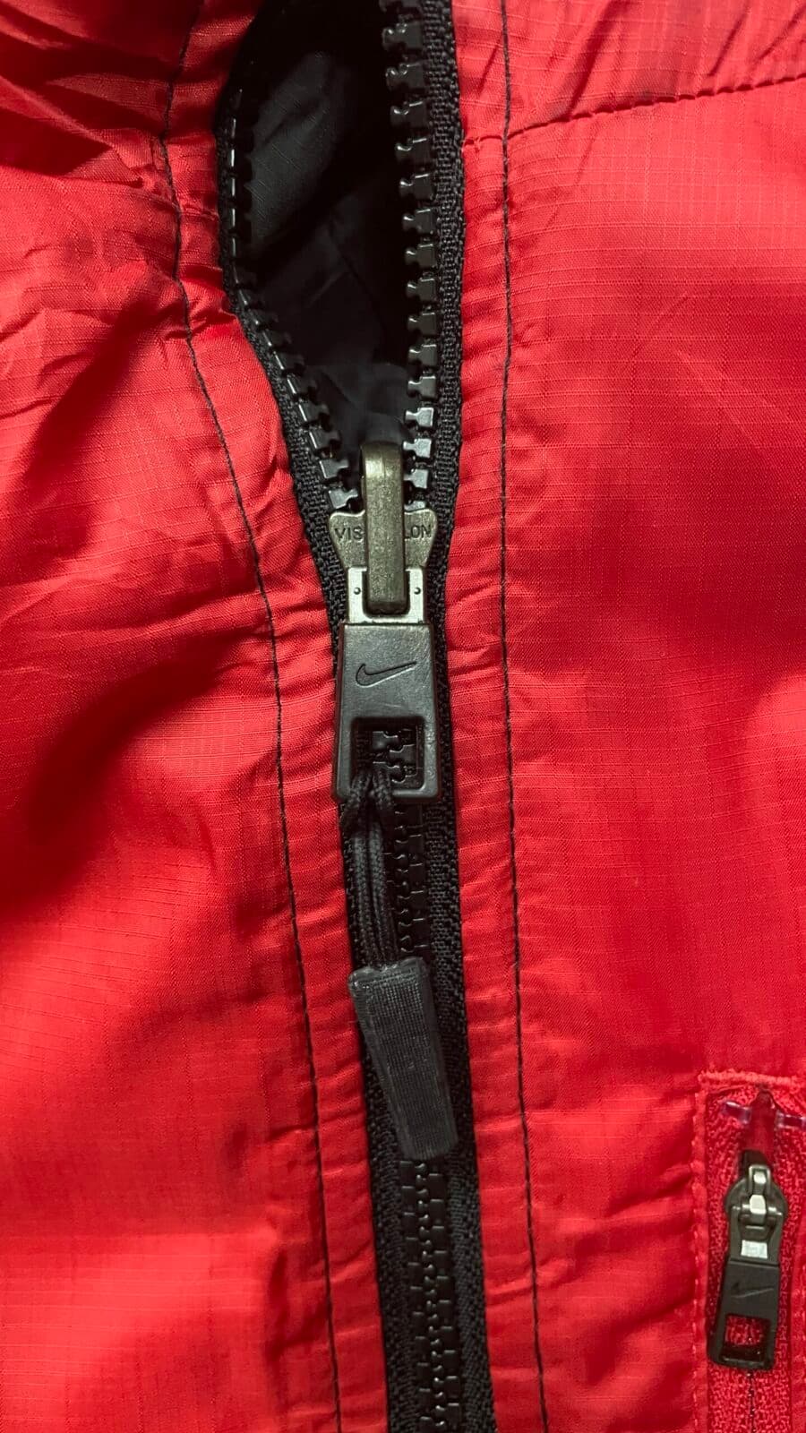 Nike thrift jacket India close-up