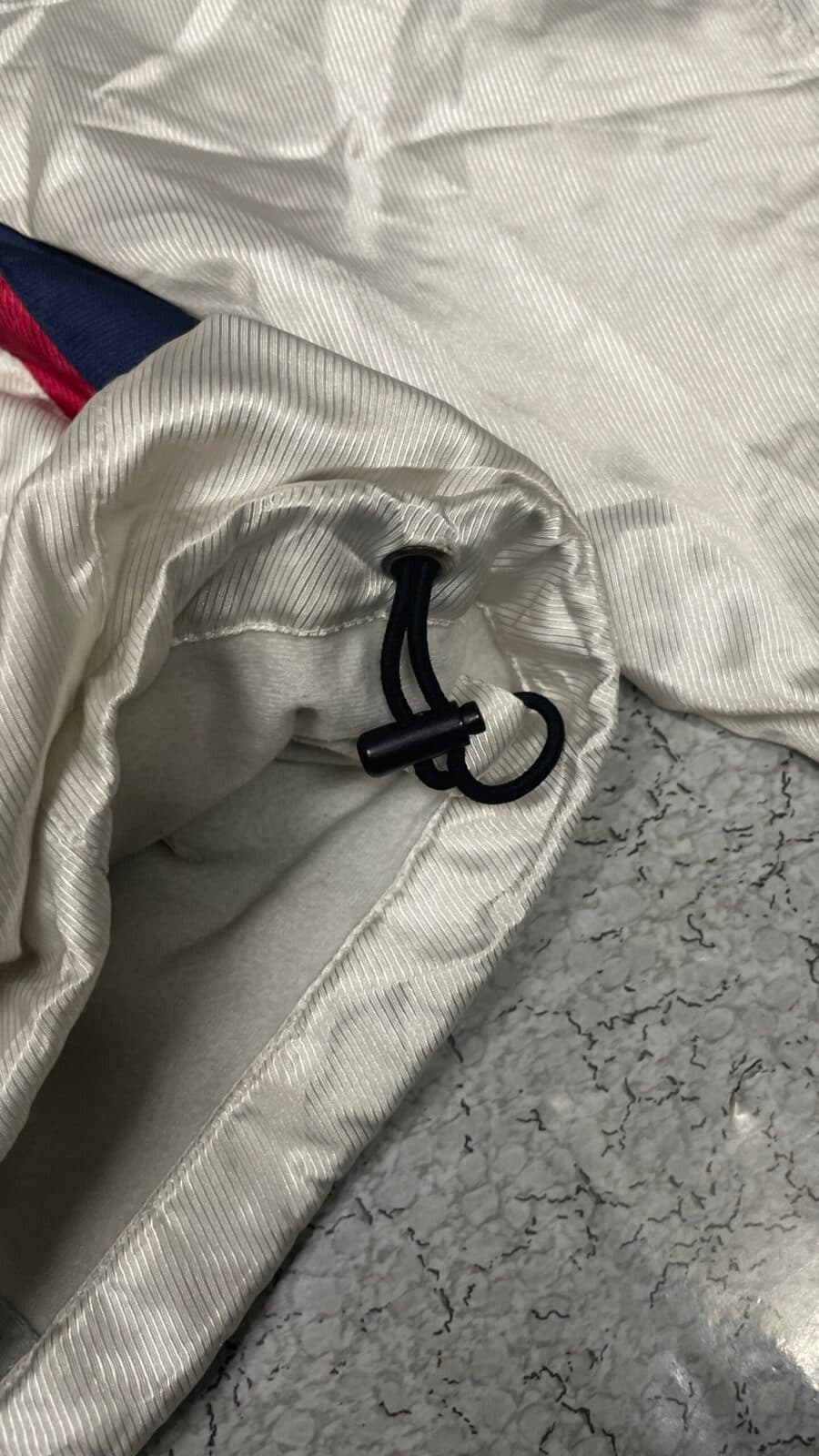 Branded thrift track jacket India close-up
