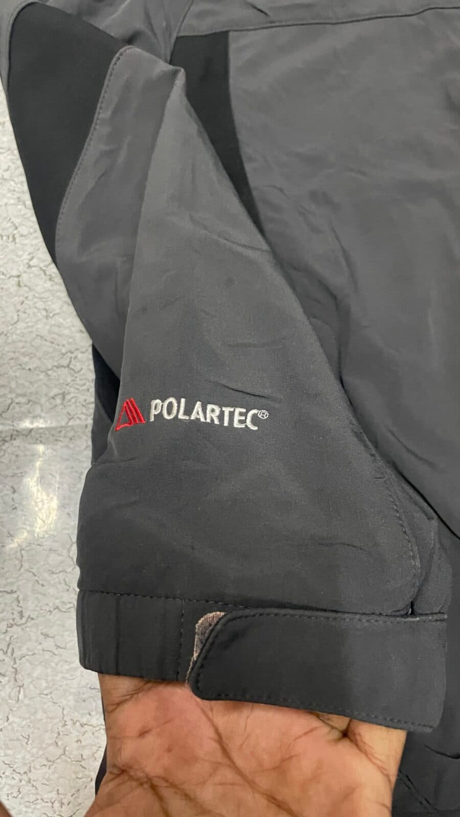 Branded thrift waterproof jacket India close-up