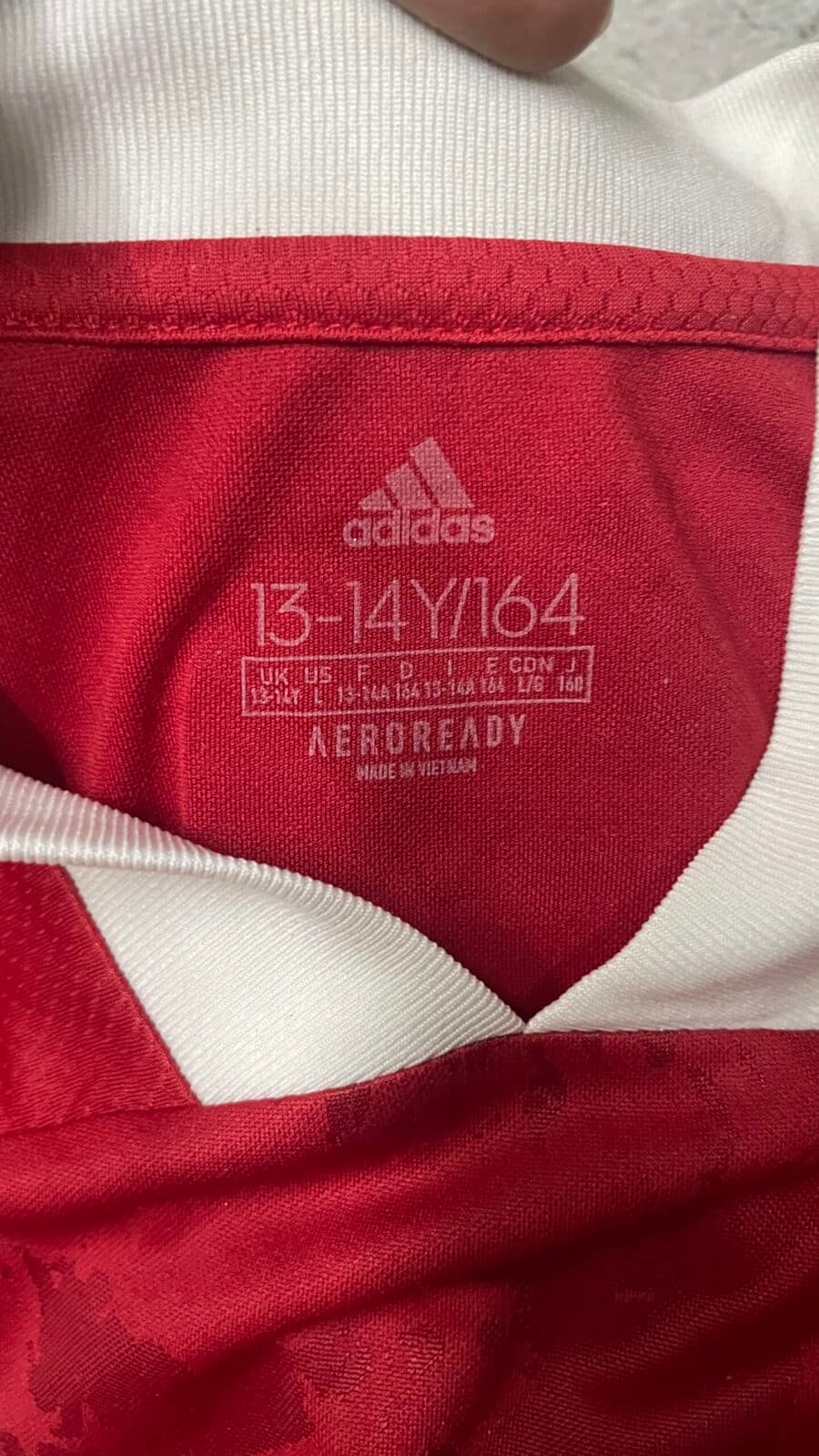Adidas thrift jersey India close-up