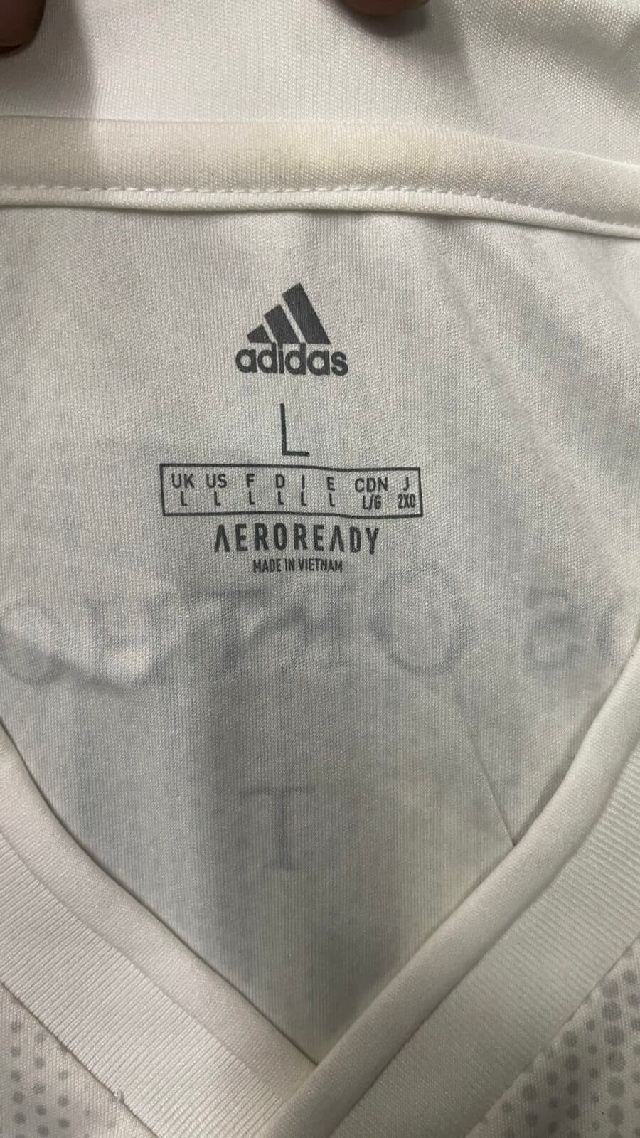 Adidas thrift jersey India close-up