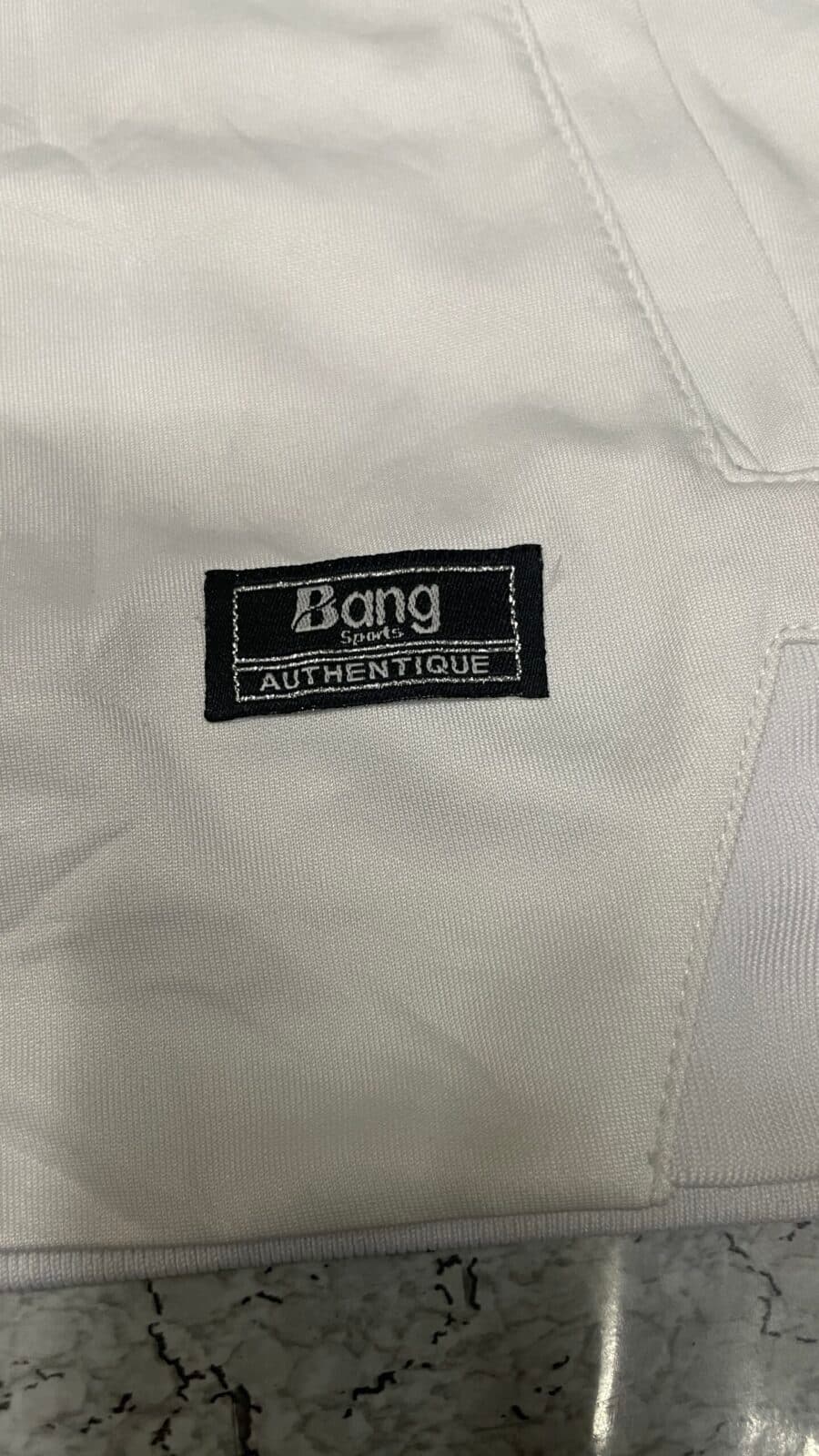Branded thrift track jacket India detail view