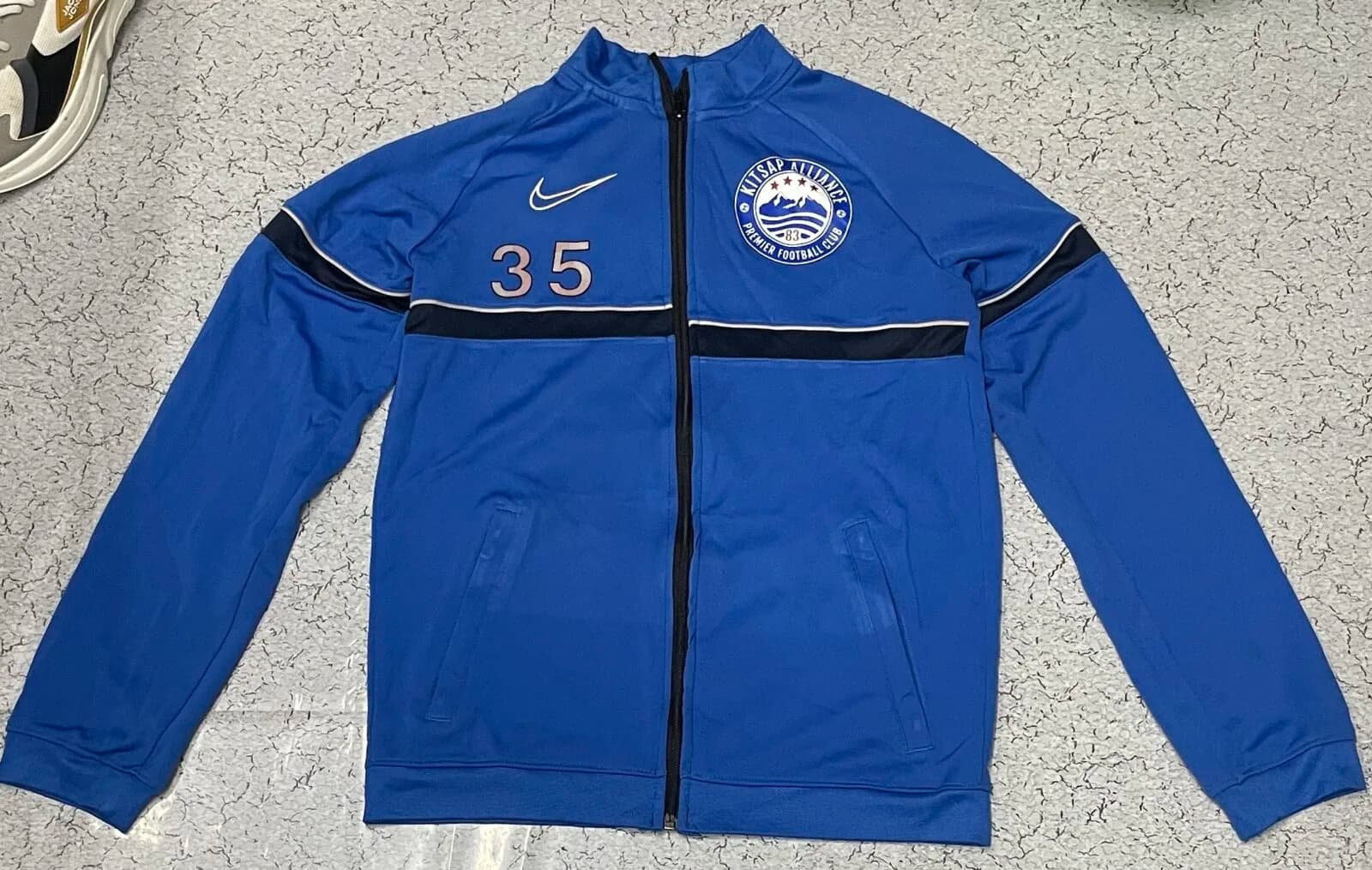 Nike Dri-FIT thrift jacket India back view