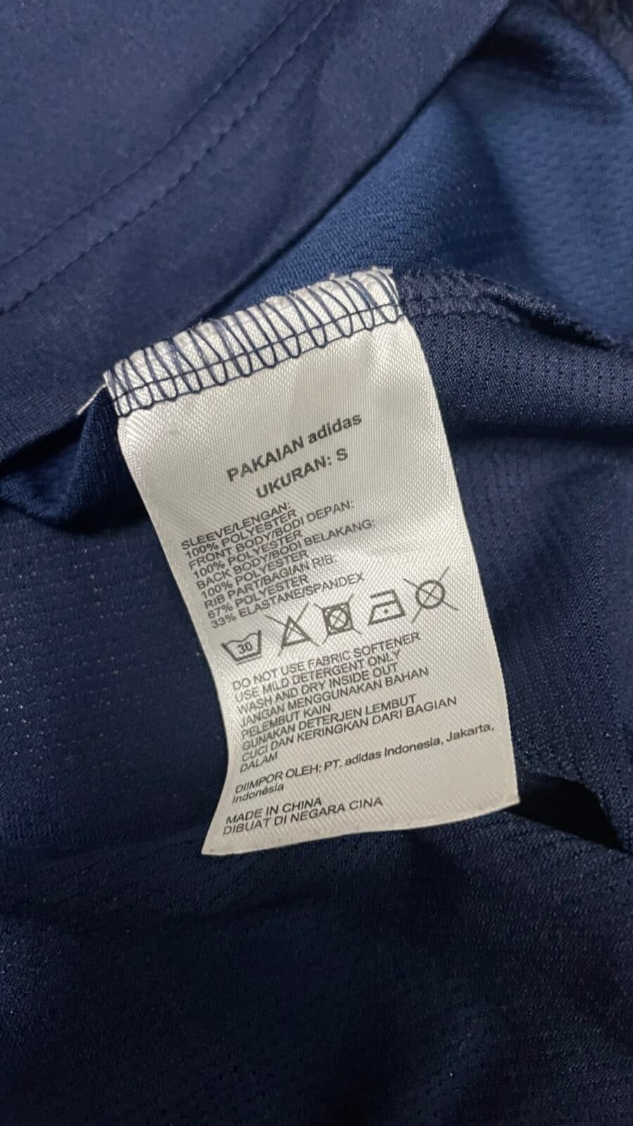 Adidas thrift t-shirt India close-up