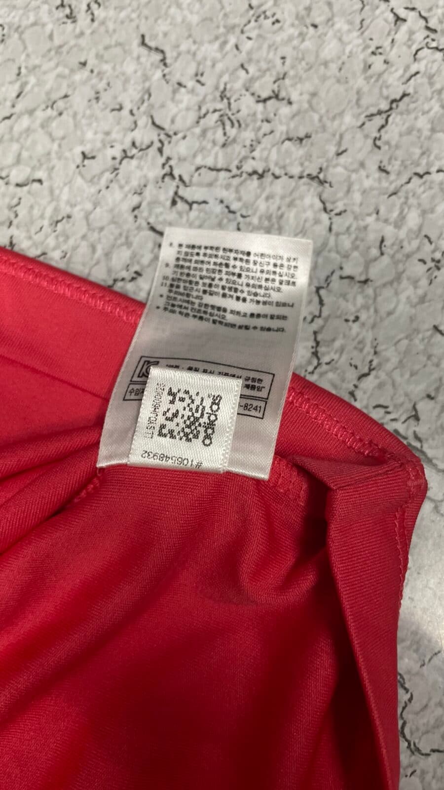 Adidas thrift t-shirt India close-up