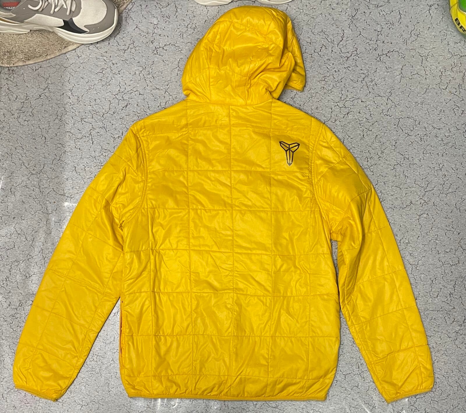 Nike thrift puffer jacket India close-up
