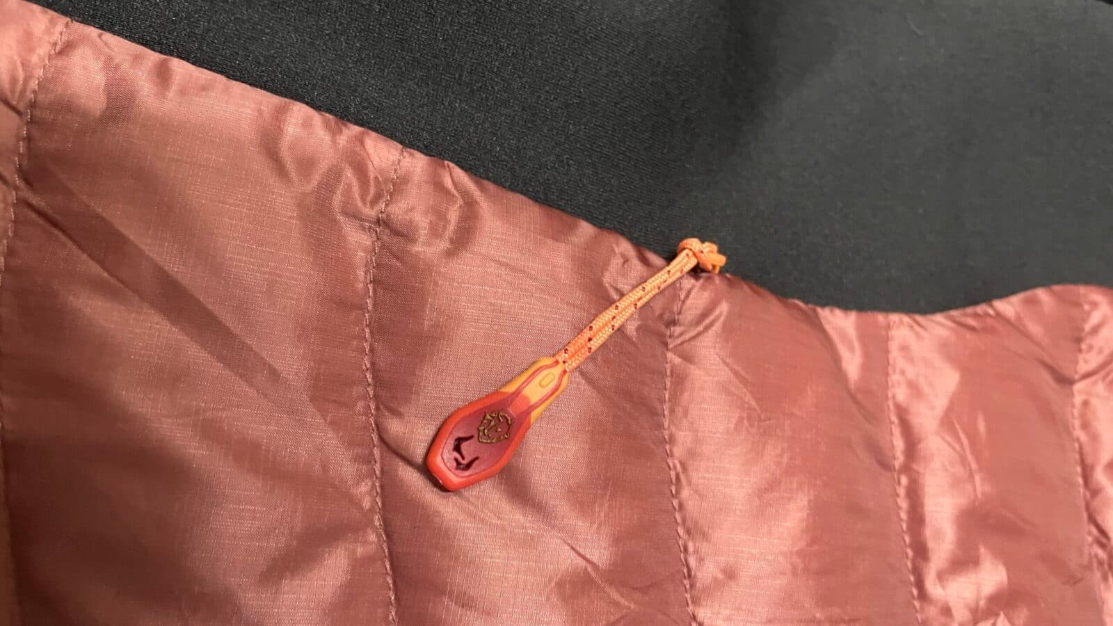 Branded thrift puffer jacket India close-up