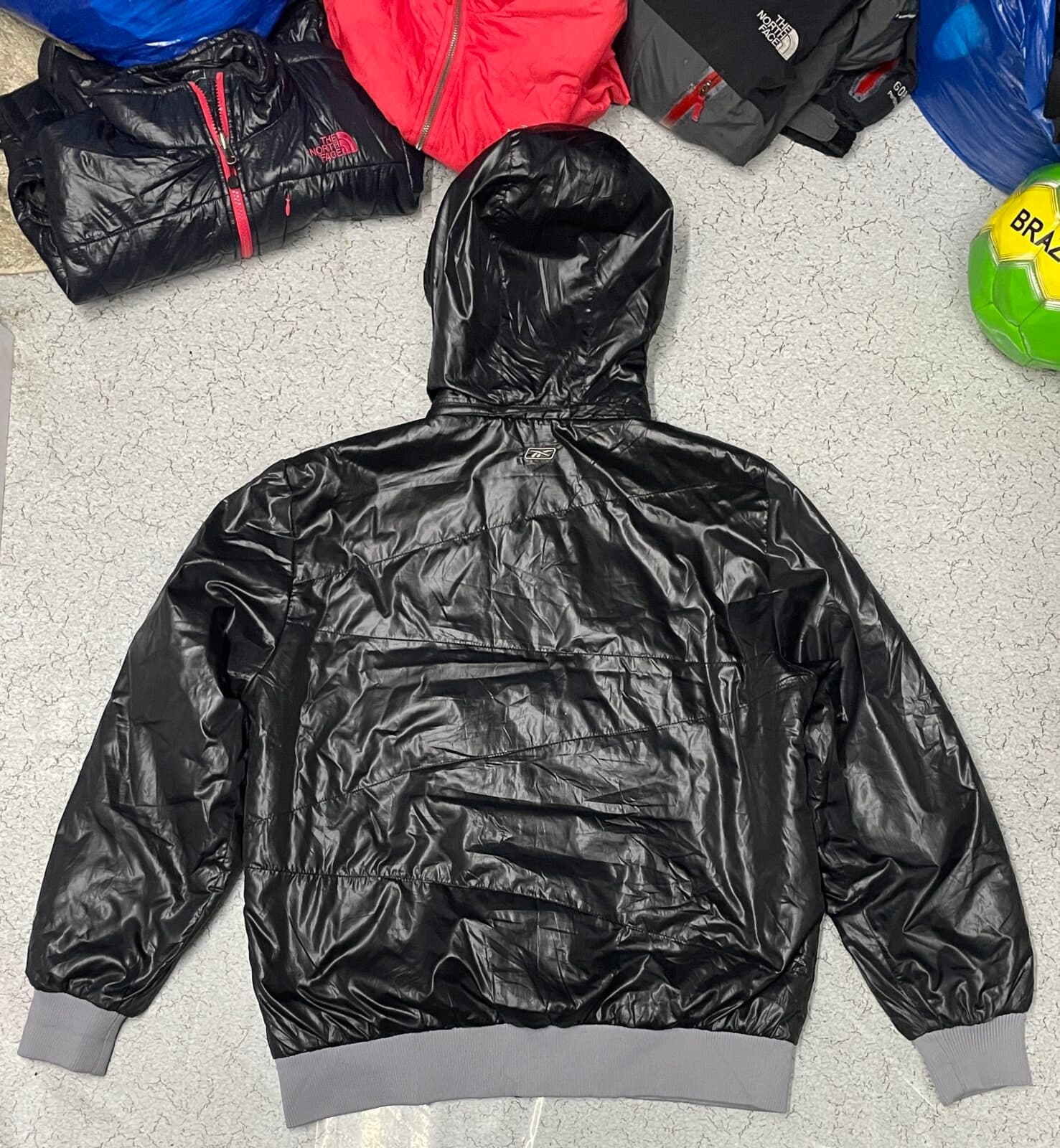 Reebok thrift puffer jacket India close-up