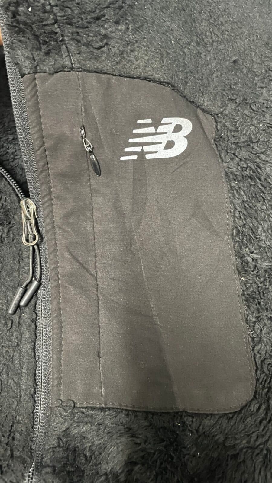 New Balance thrift fleece jacket India close-up