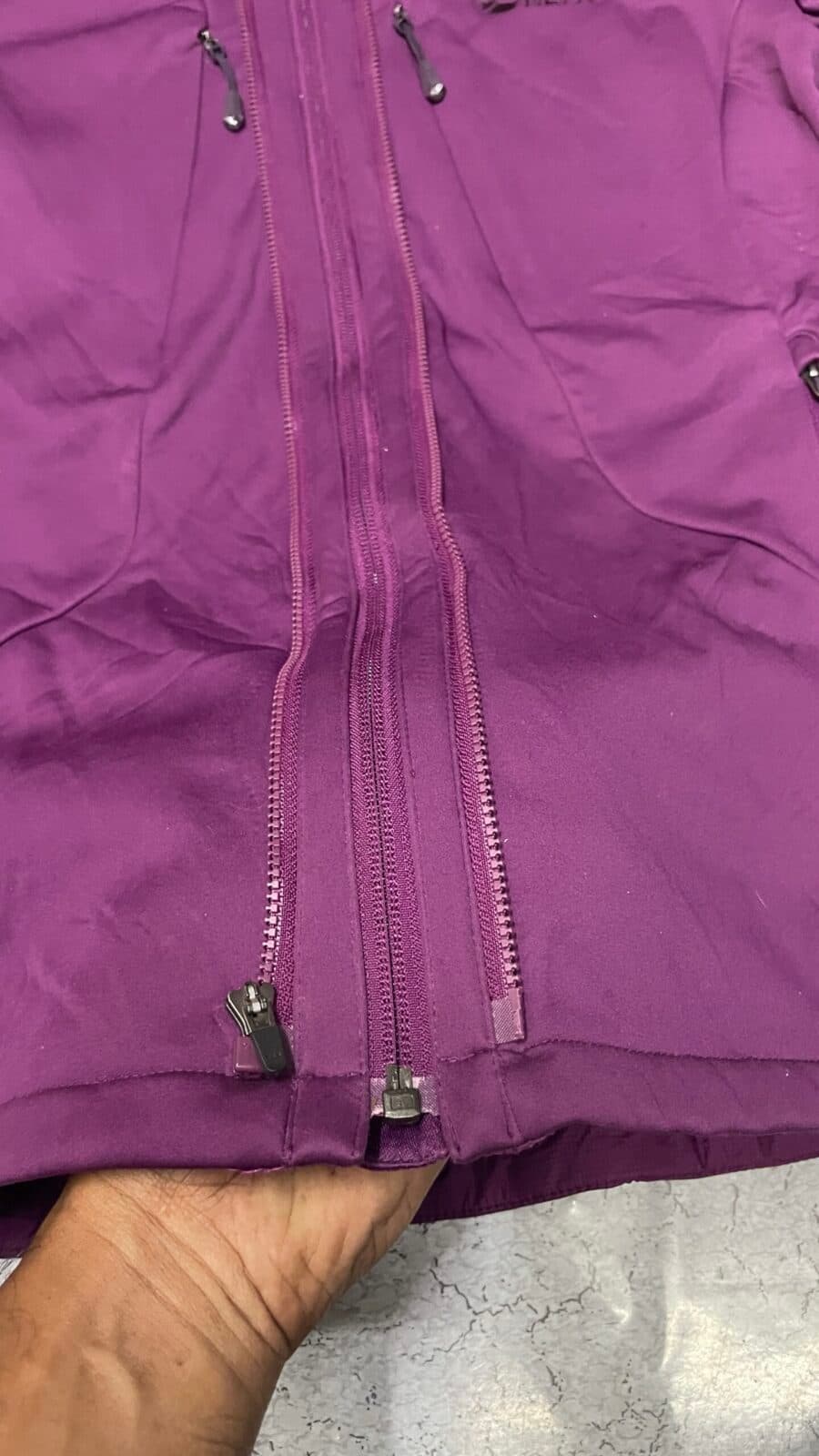 Branded thrift puffer jacket India close-up