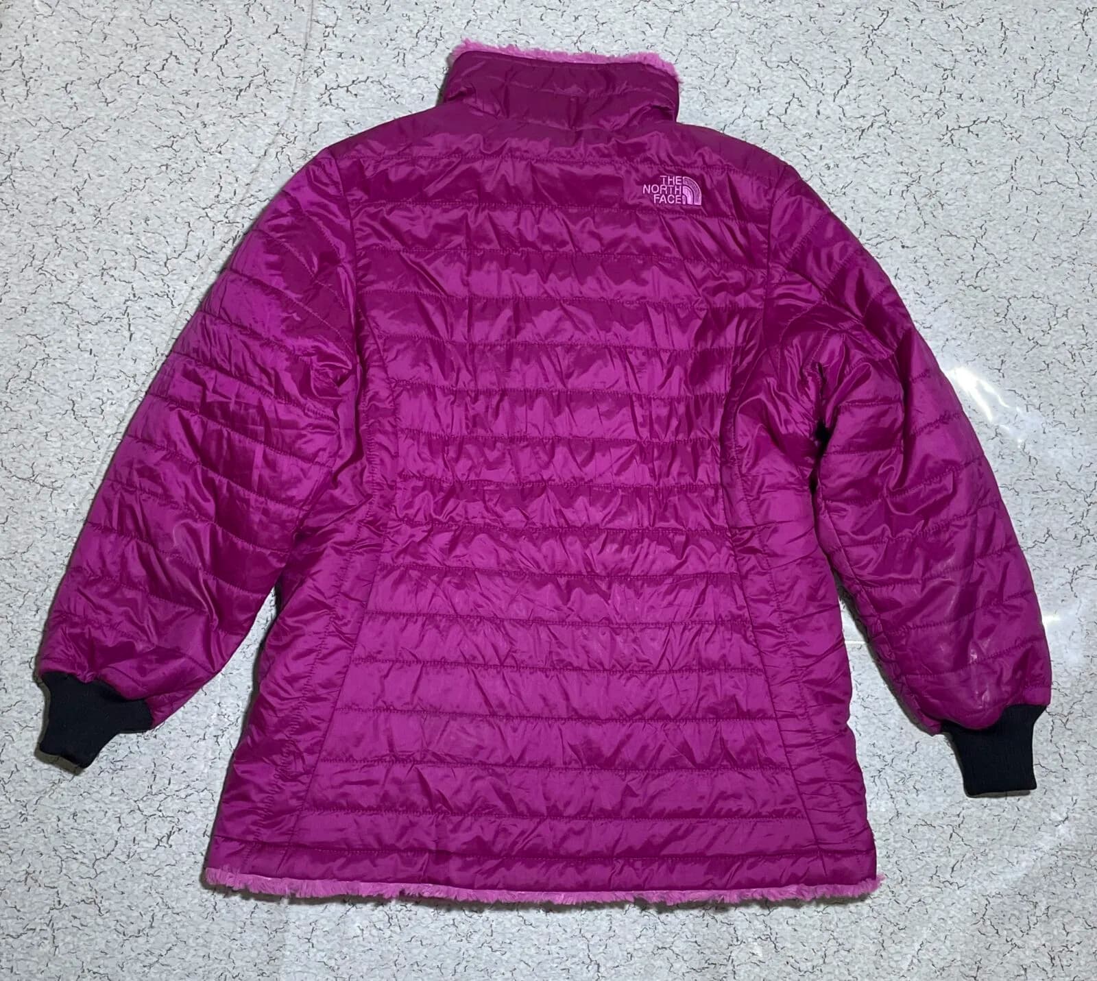 The North Face thrift puffer jacket India close-up
