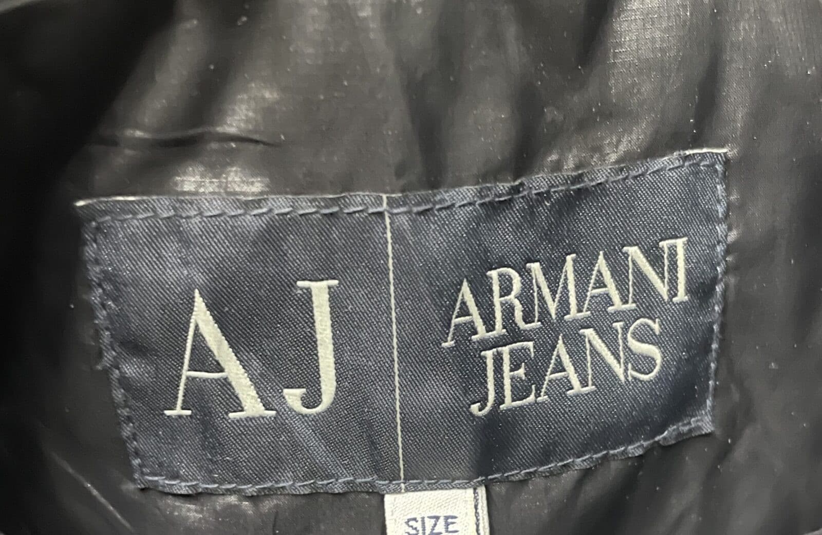 Branded thrift puffer jacket India close-up