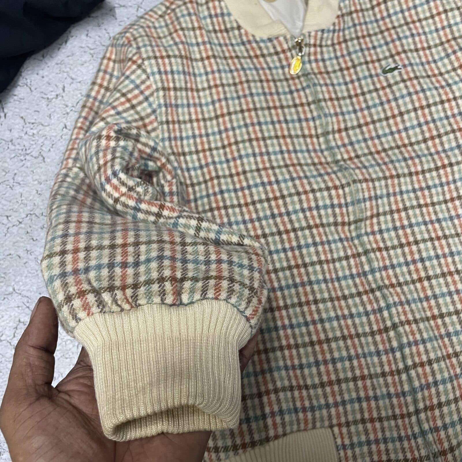 Lacoste thrift bomber jacket India close-up