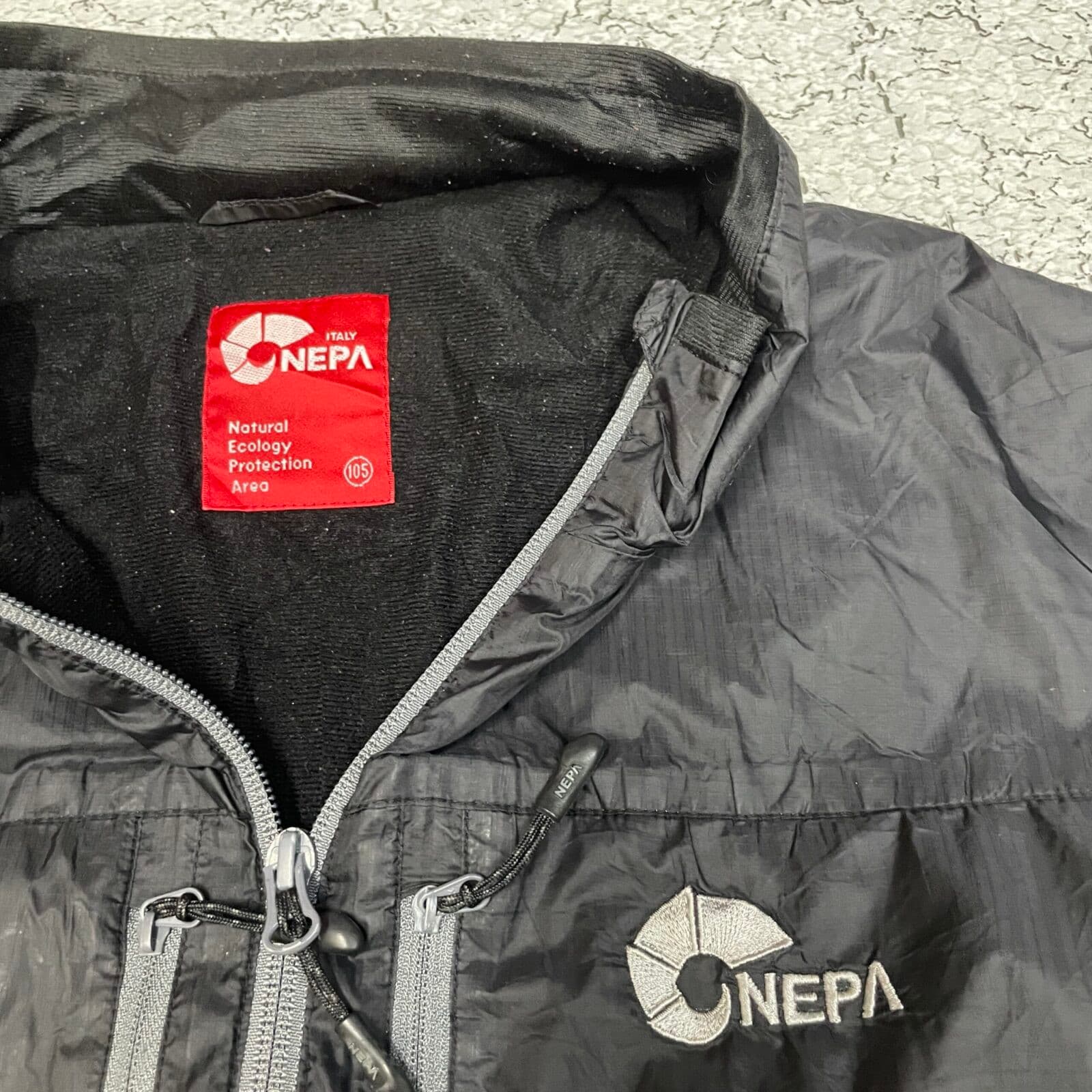 Branded thrift windbreaker jacket India close-up