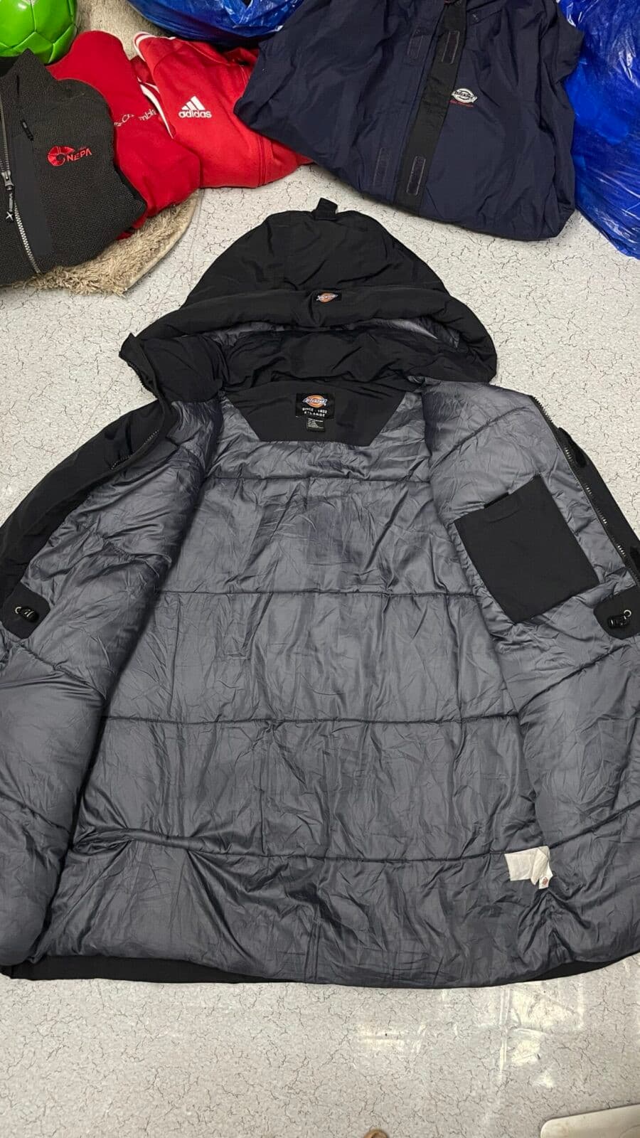 Branded thrift parka jacket India close-up