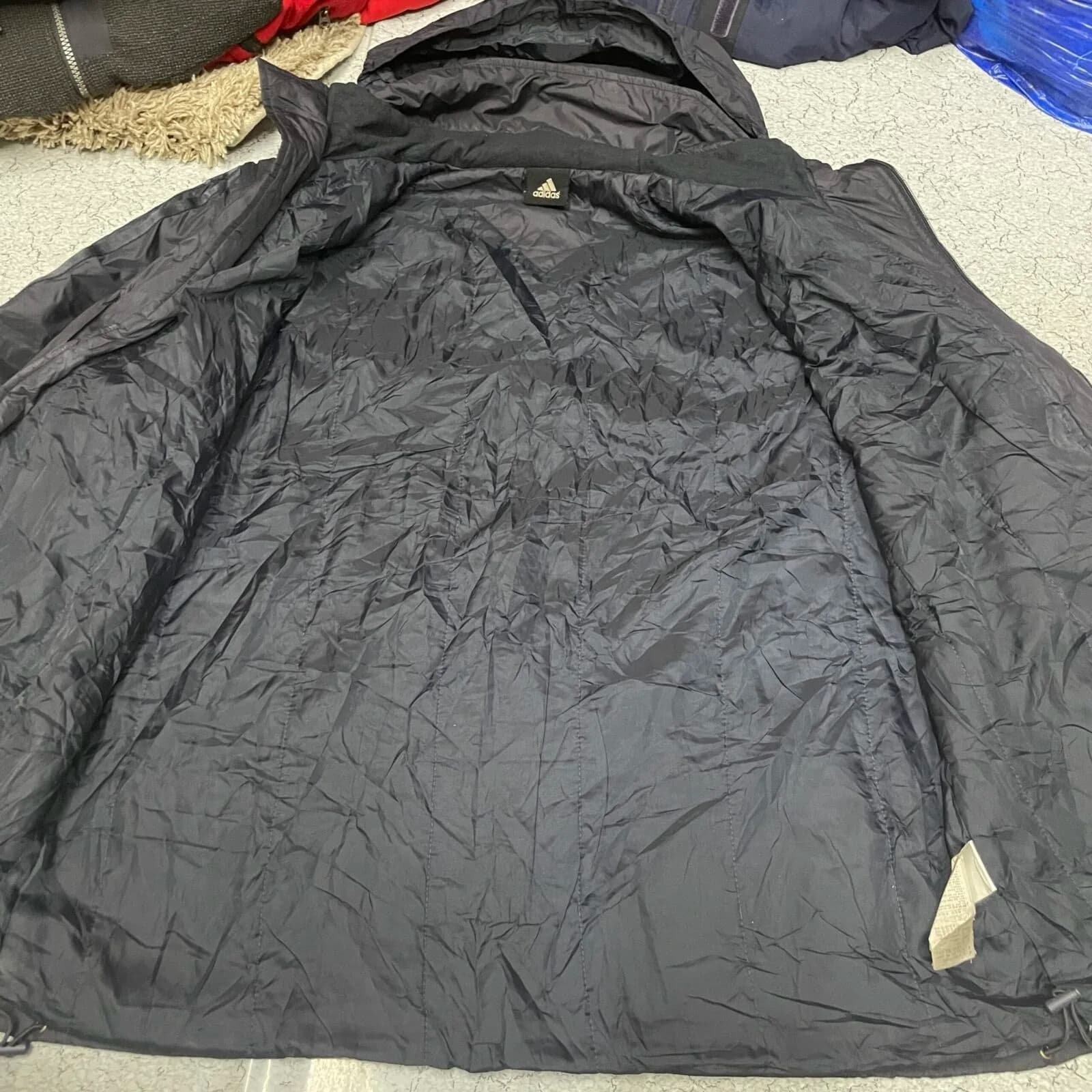Adidas thrift puffer jacket India back view