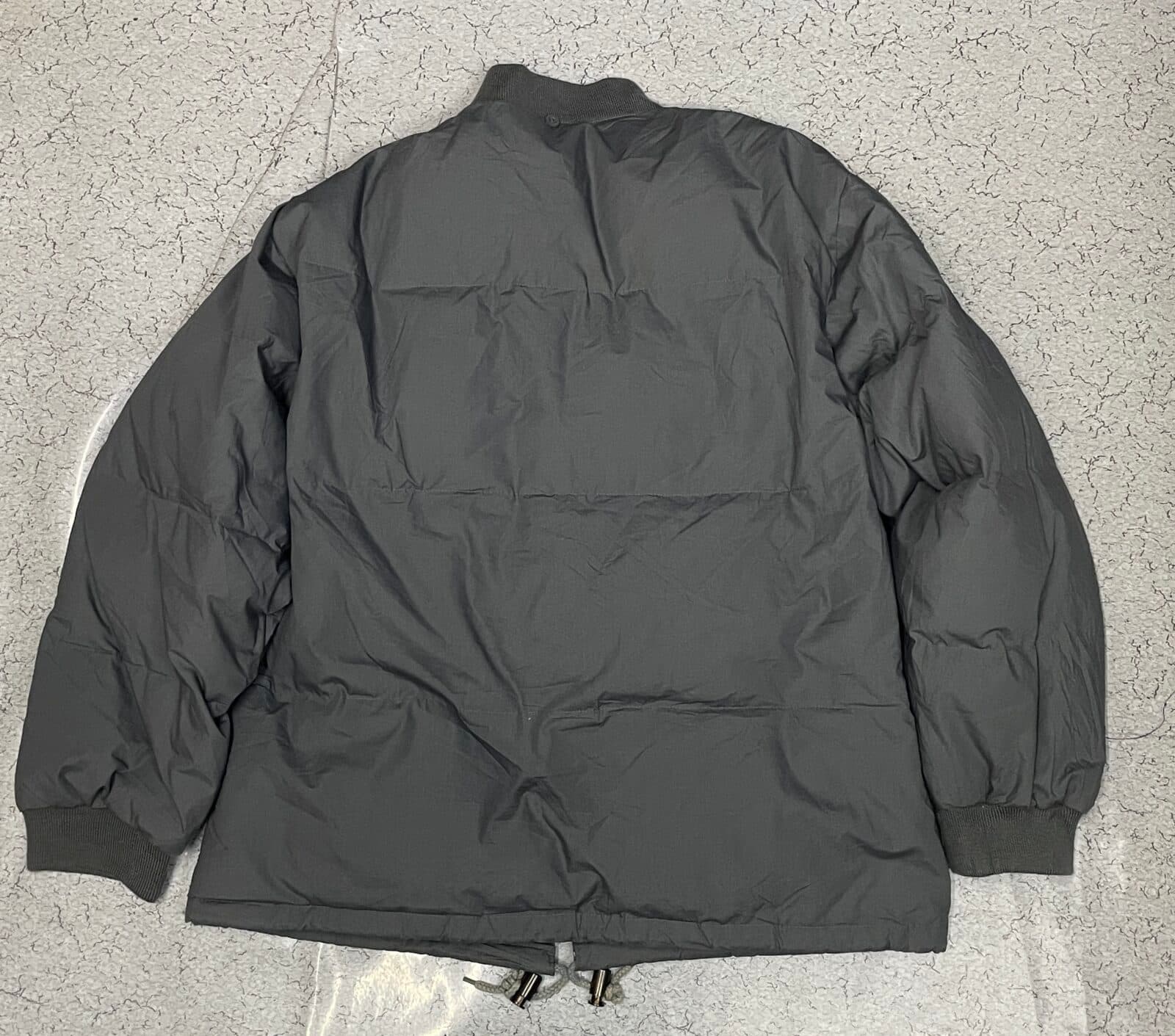 Branded thrift puffer jacket India close-up