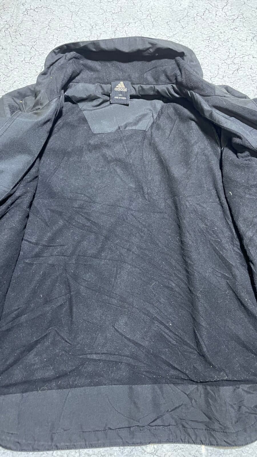 Adidas thrift track jacket India close-up
