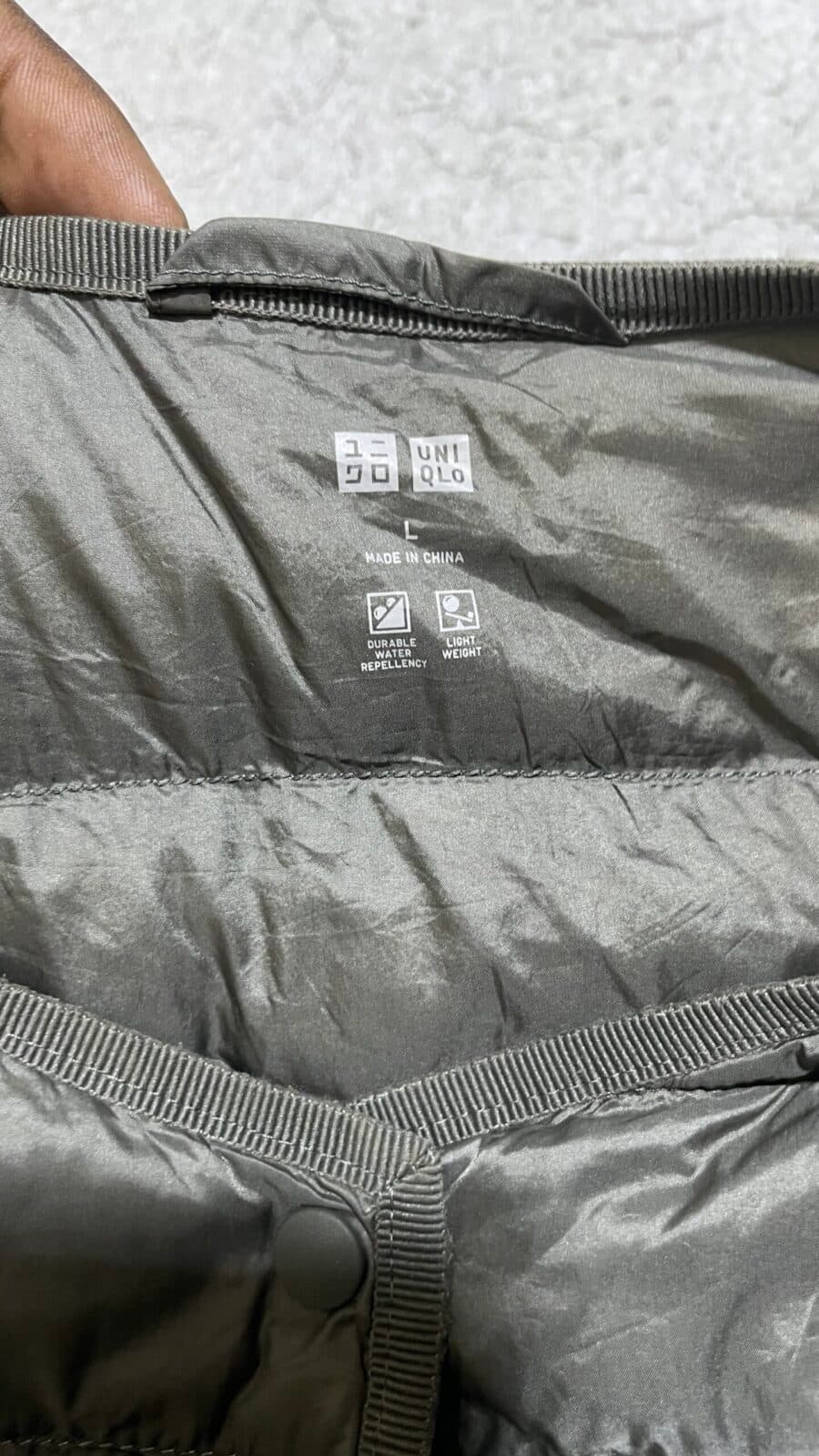 Uniqlo thrift puffer jacket India close-up