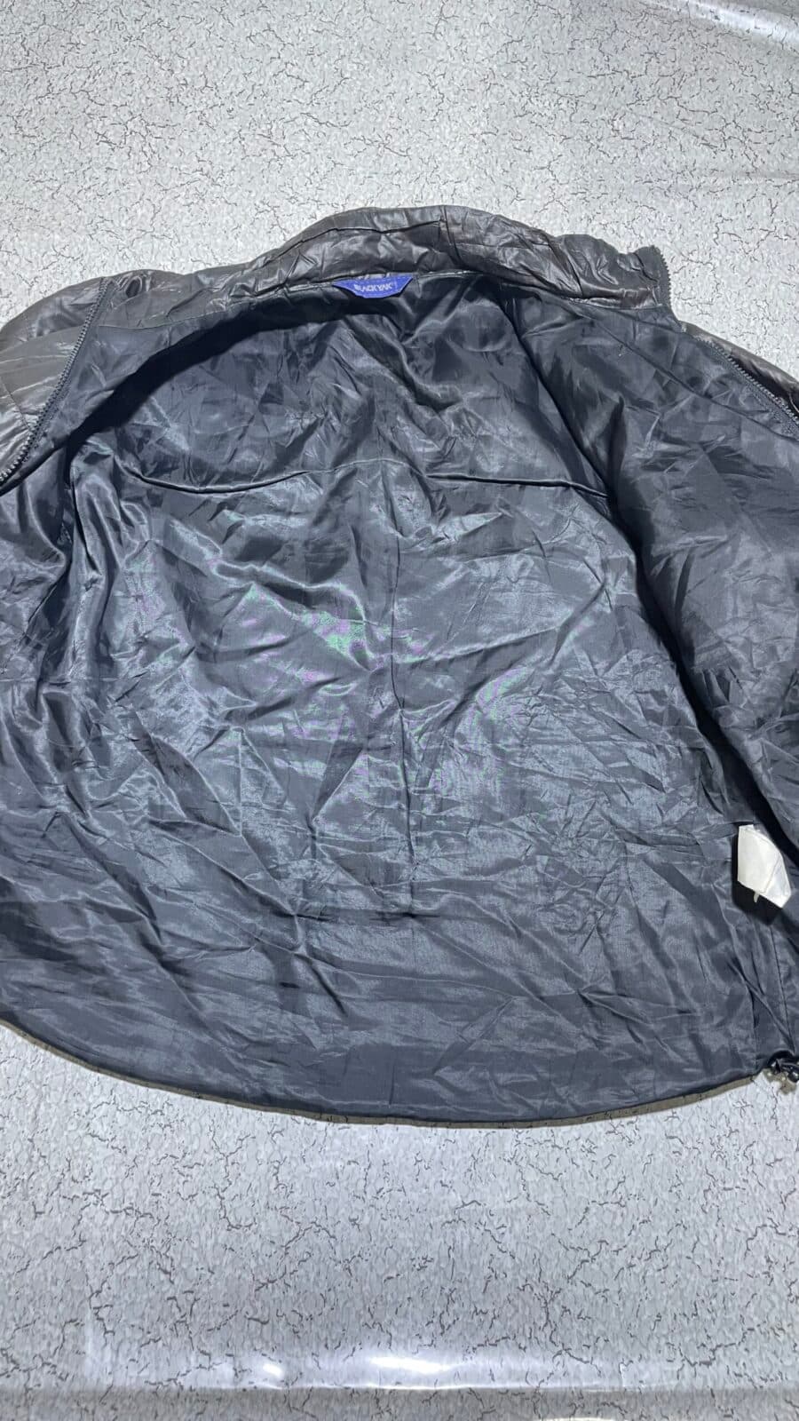Branded thrift puffer jacket India detail view