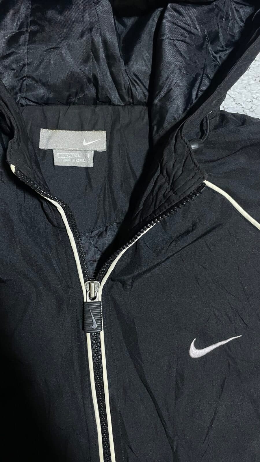 Nike thrift puffer jacket India close-up
