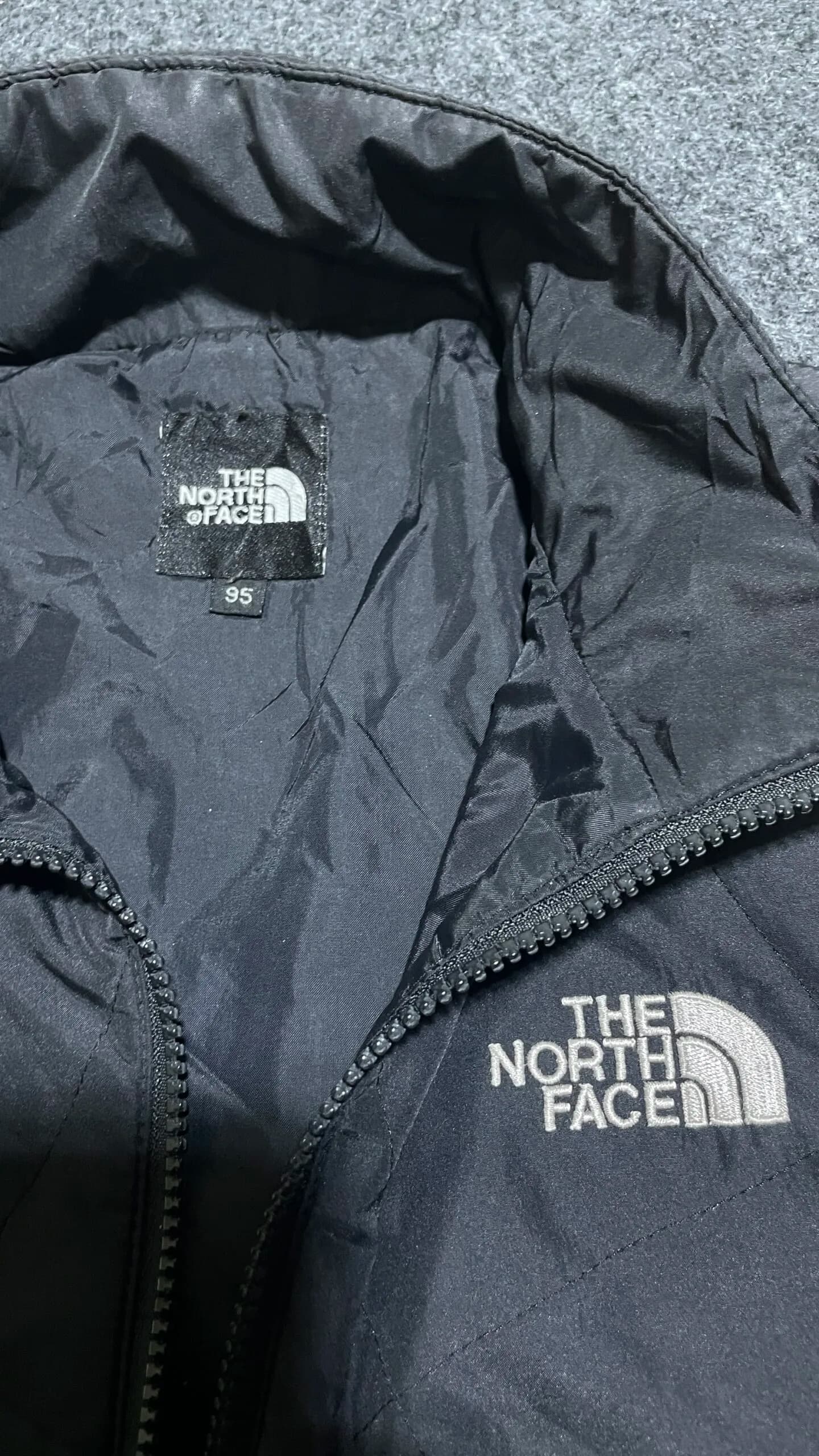 The North Face thrift puffer jacket India close-up
