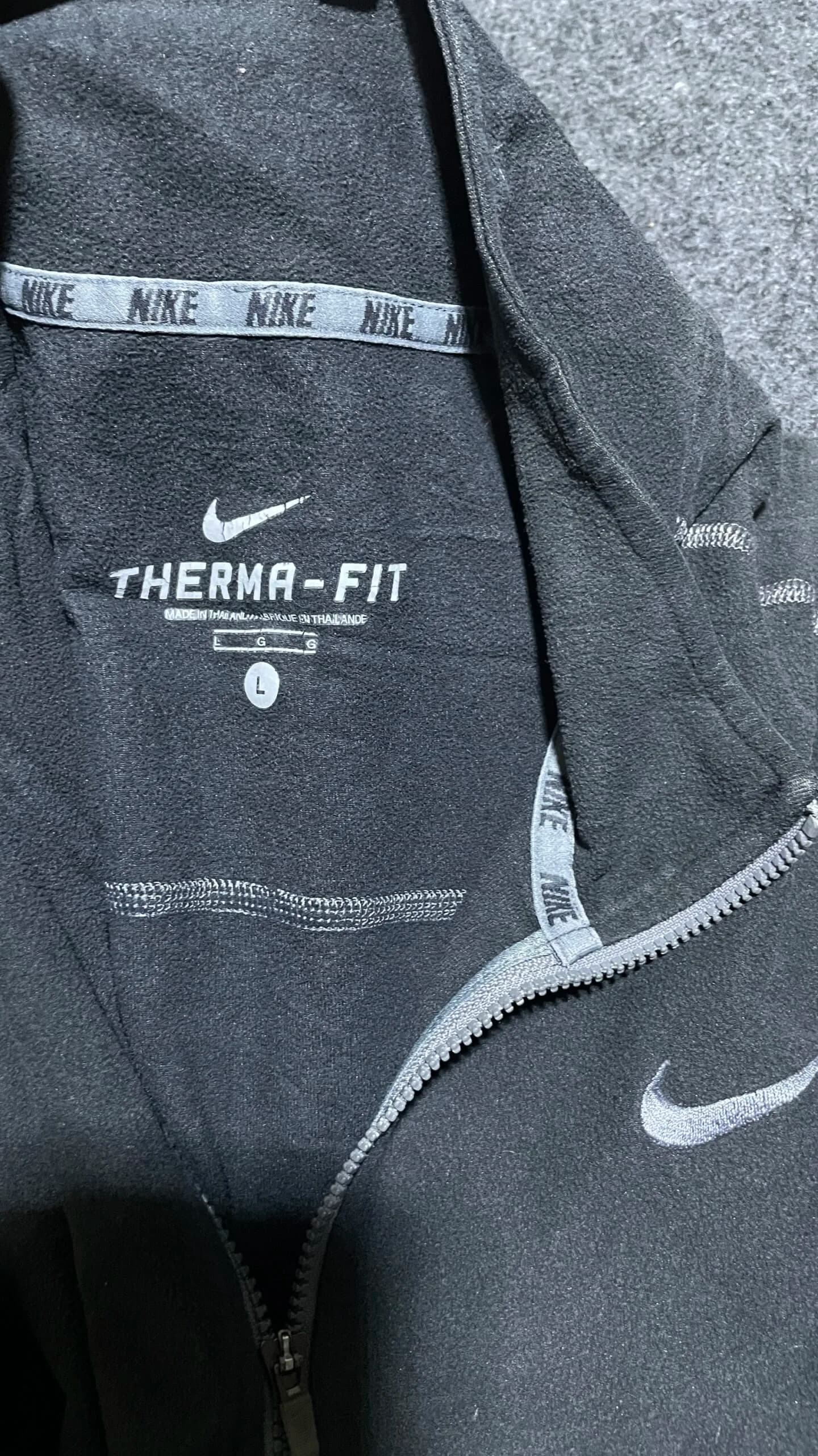 Nike thrift sweater India close-up