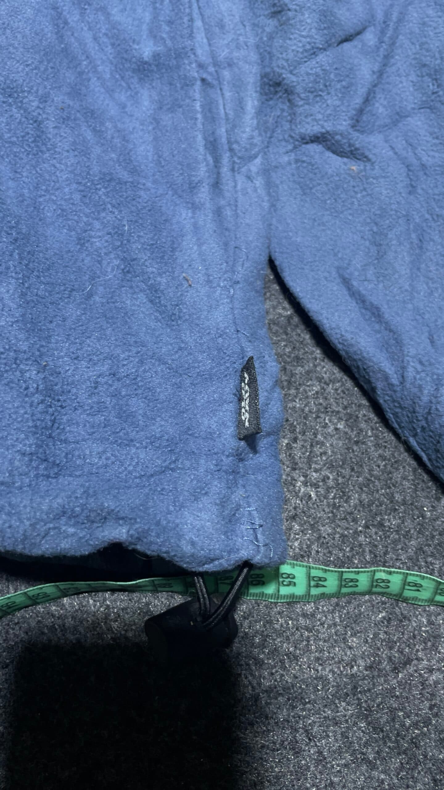 Branded thrift fleece jacket India close-up