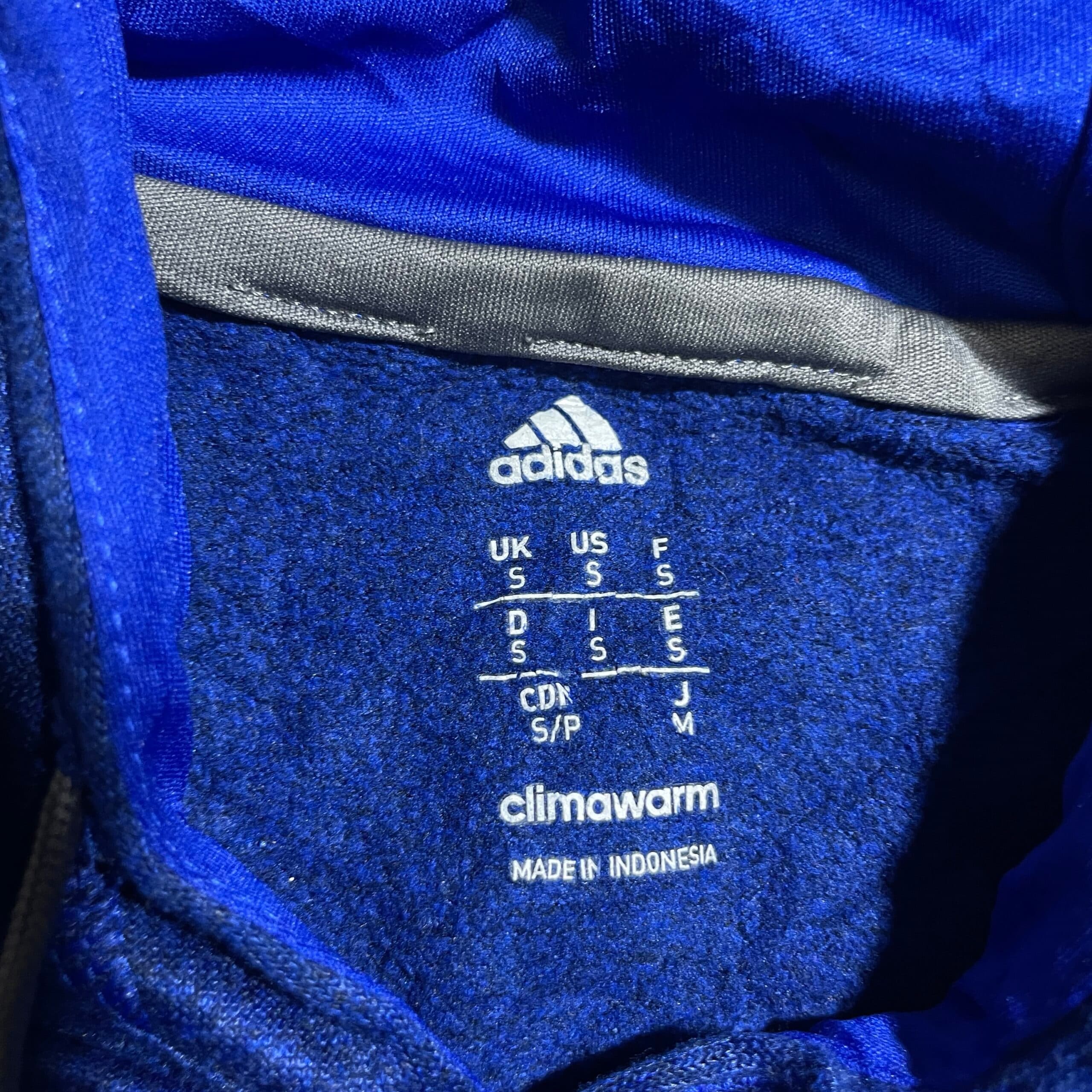 Adidas thrift hoodie India close-up
