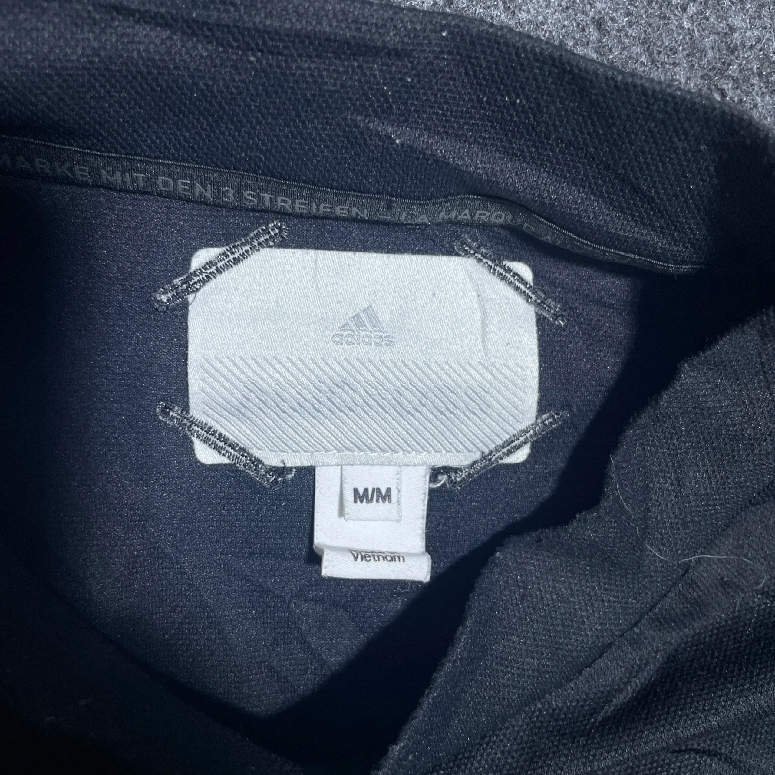 Adidas thrift t-shirt India close-up