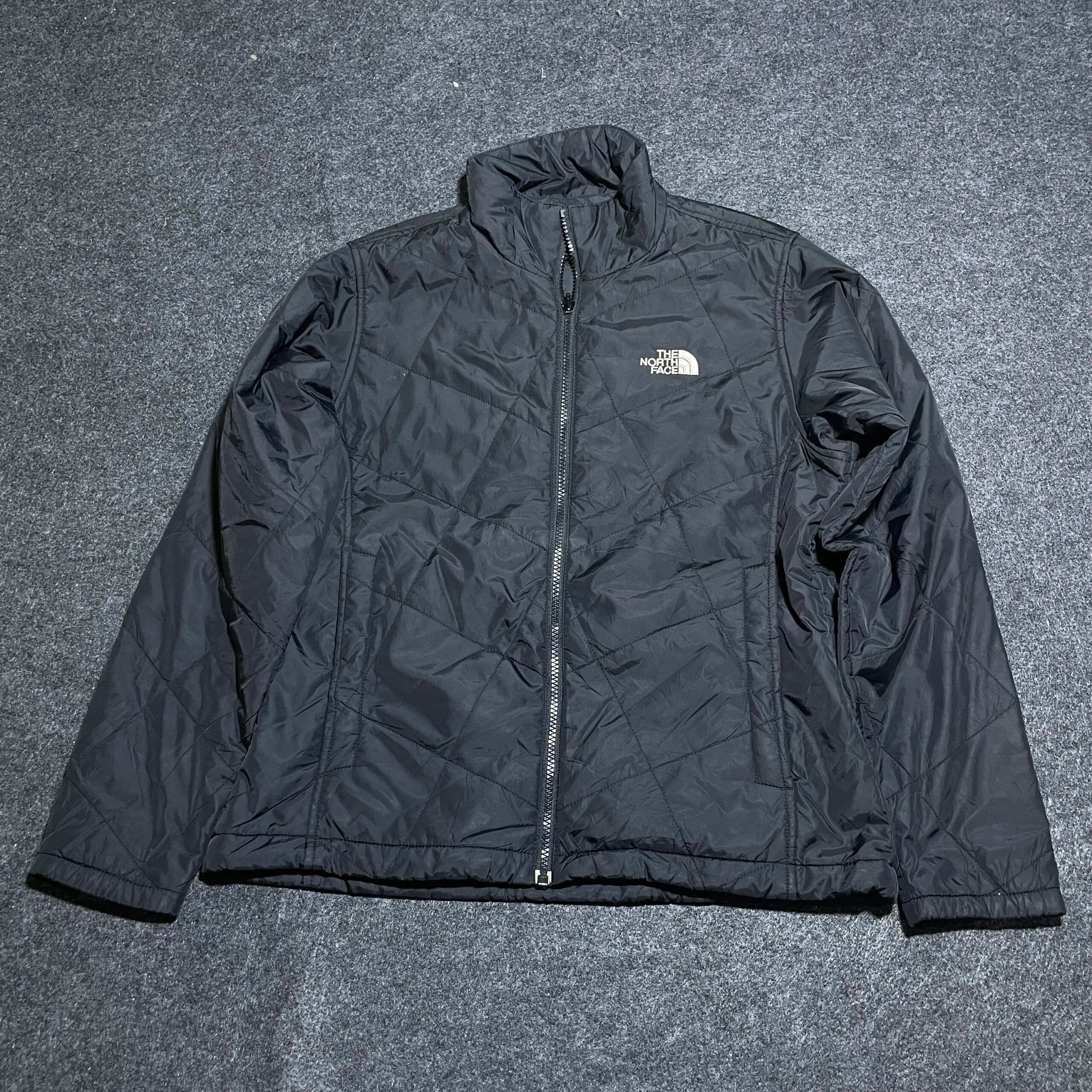 The North Face thrift puffer jacket India close-up