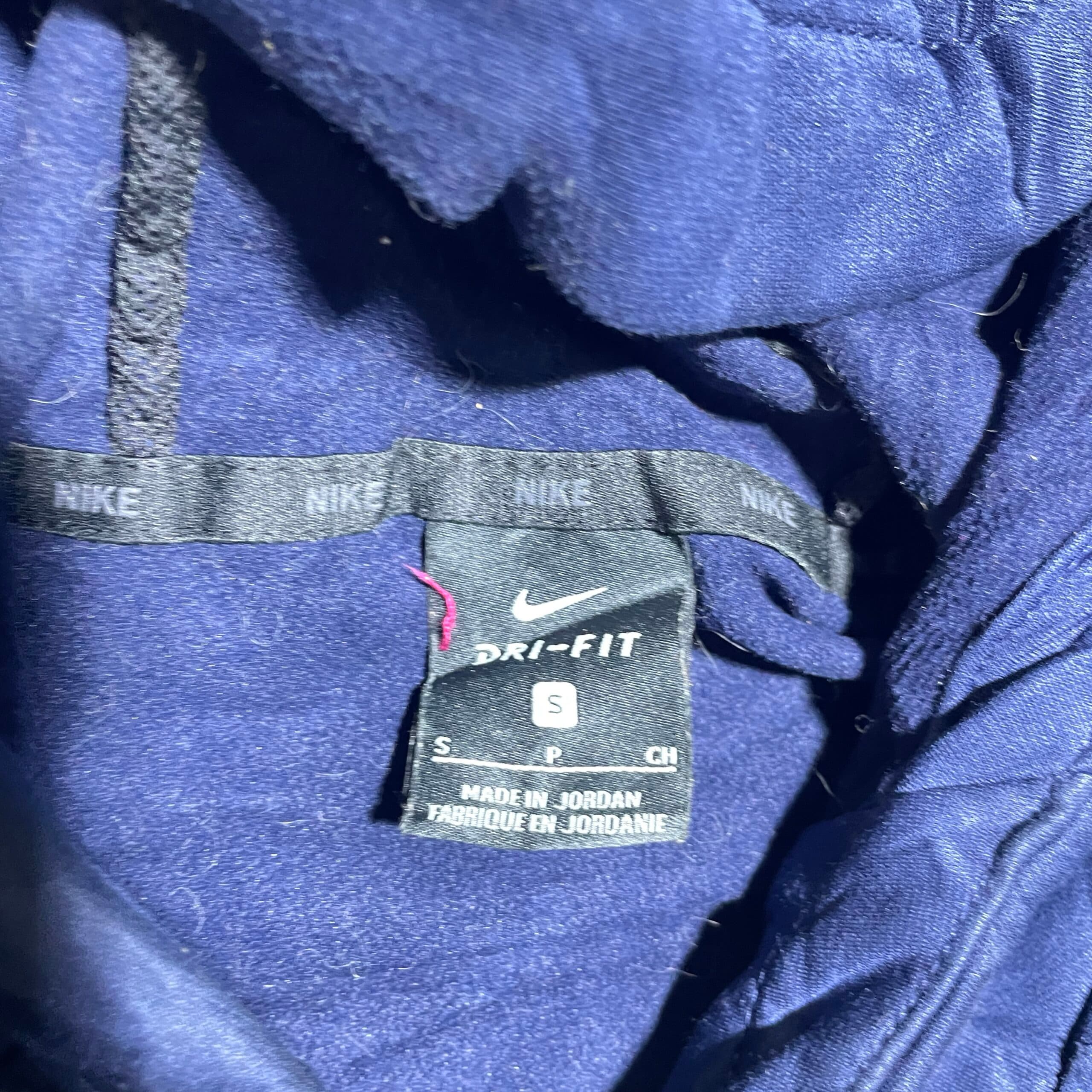Nike thrift hoodie India close-up