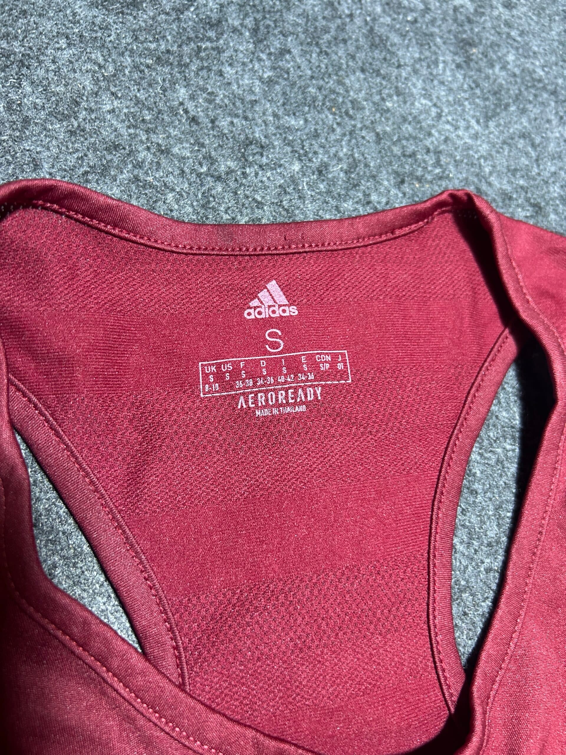 Adidas thrift tank top India close-up