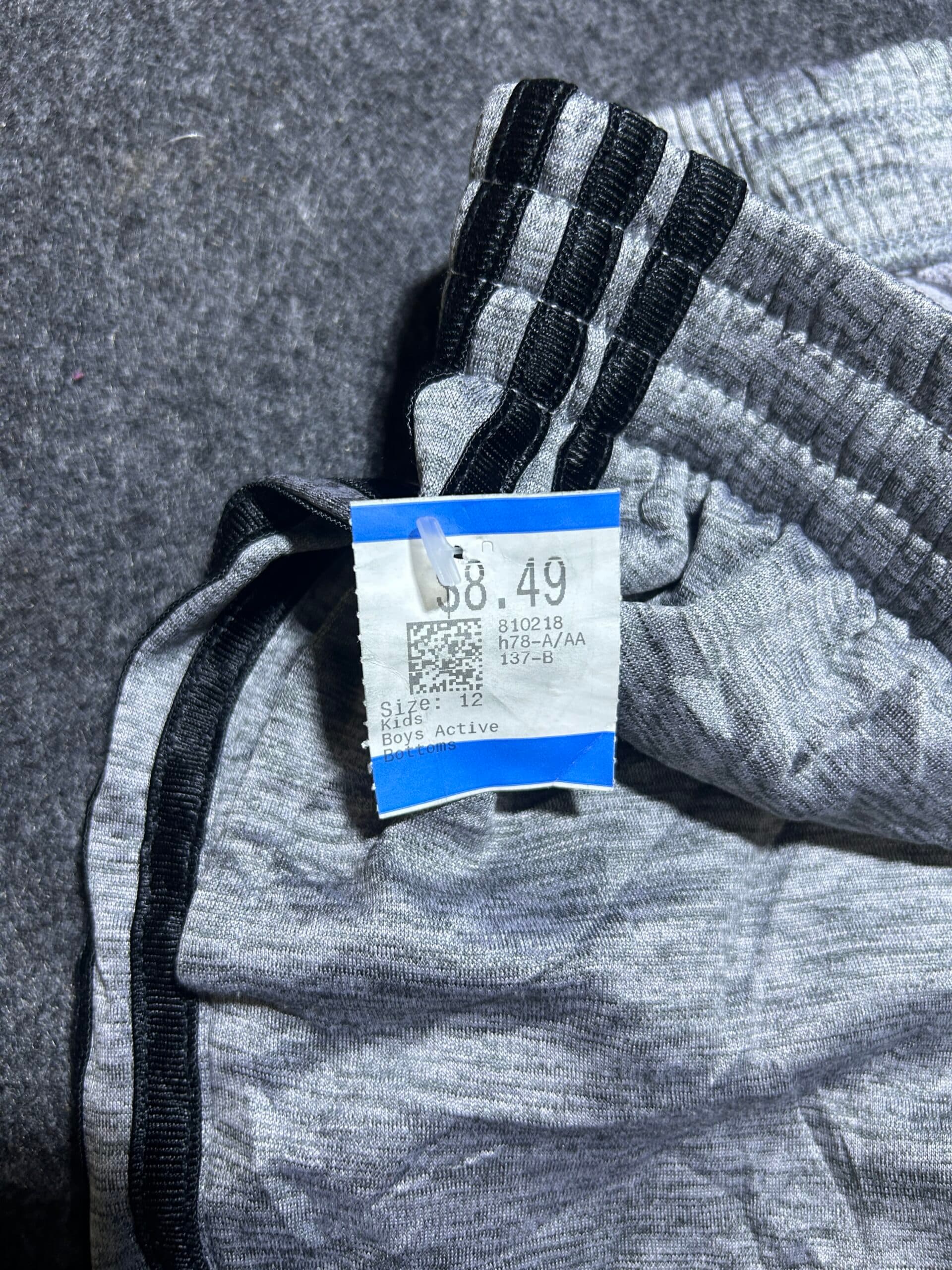 Adidas thrift shorts India close-up