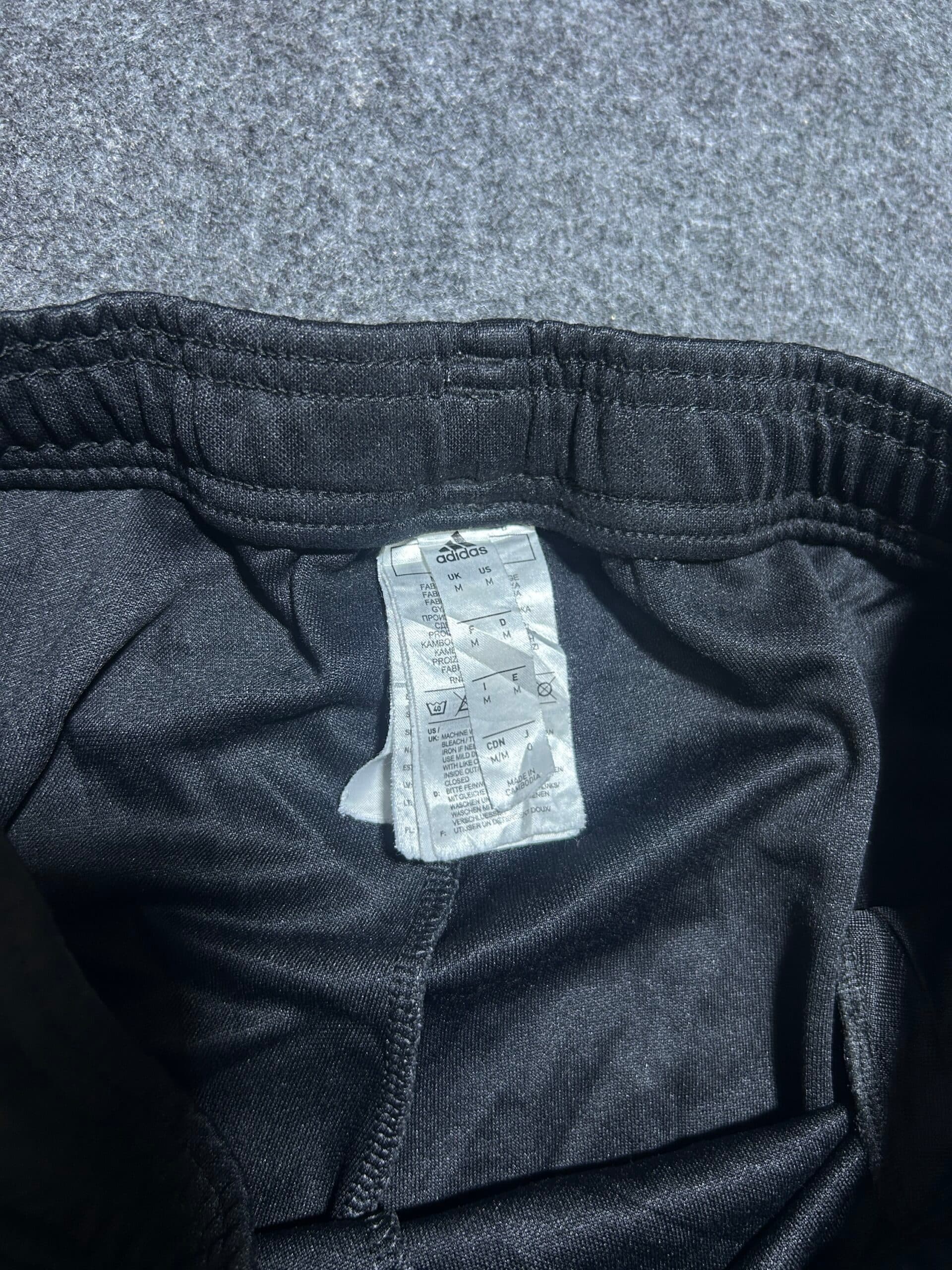 Adidas thrift clothing India close-up