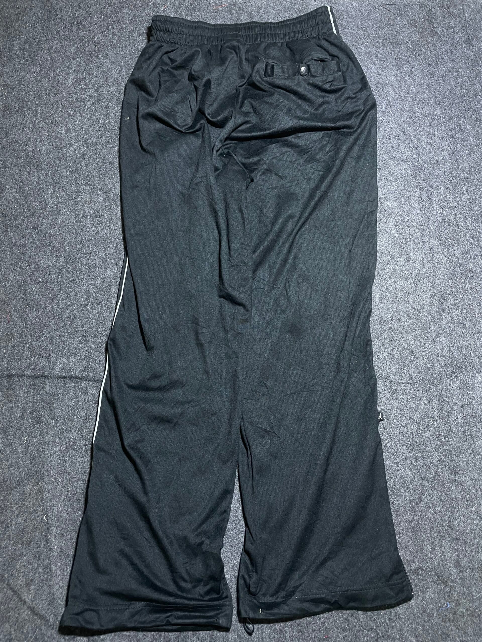 Branded thrift track pants India close-up