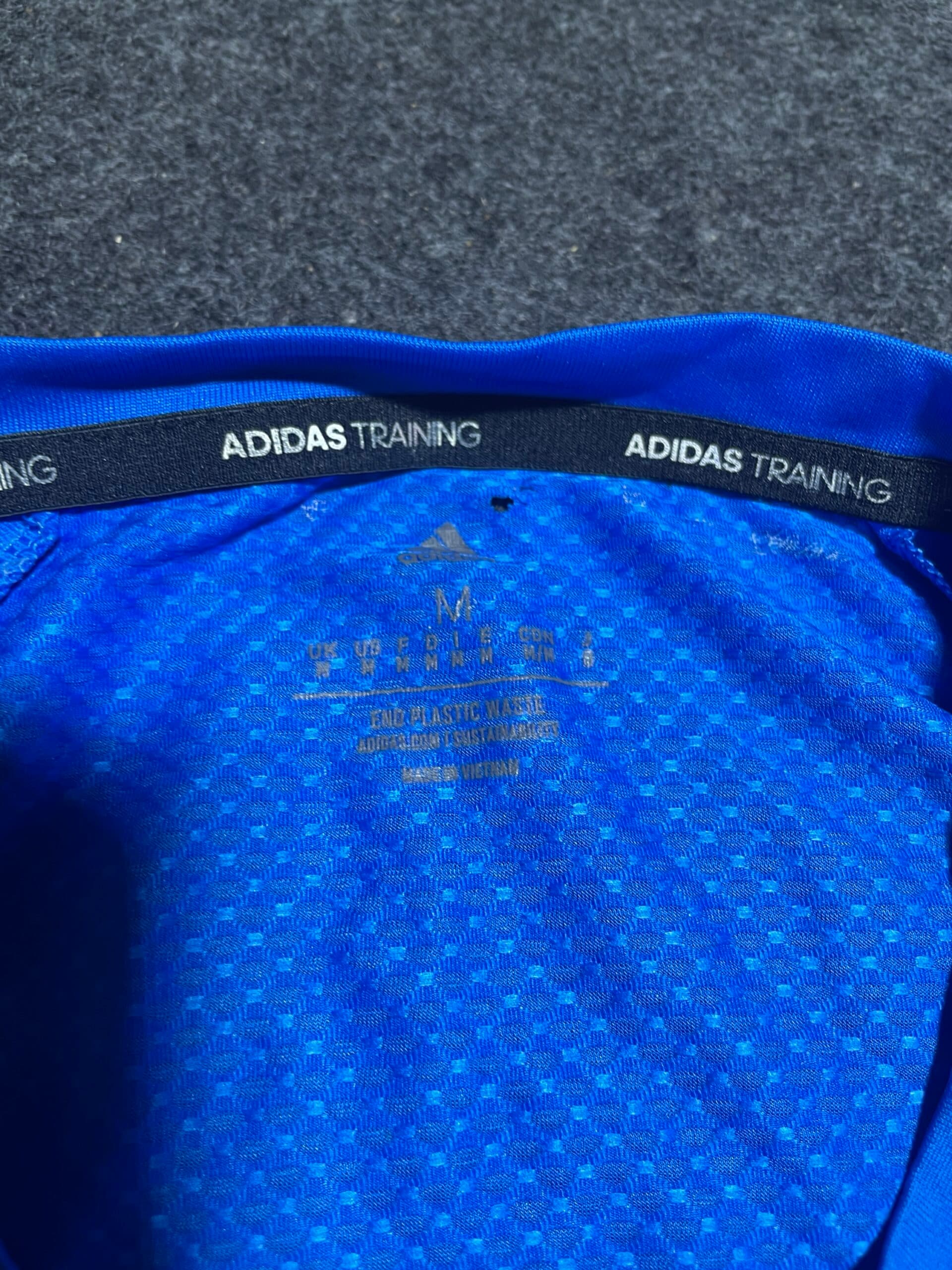 Adidas thrift t-shirt India close-up