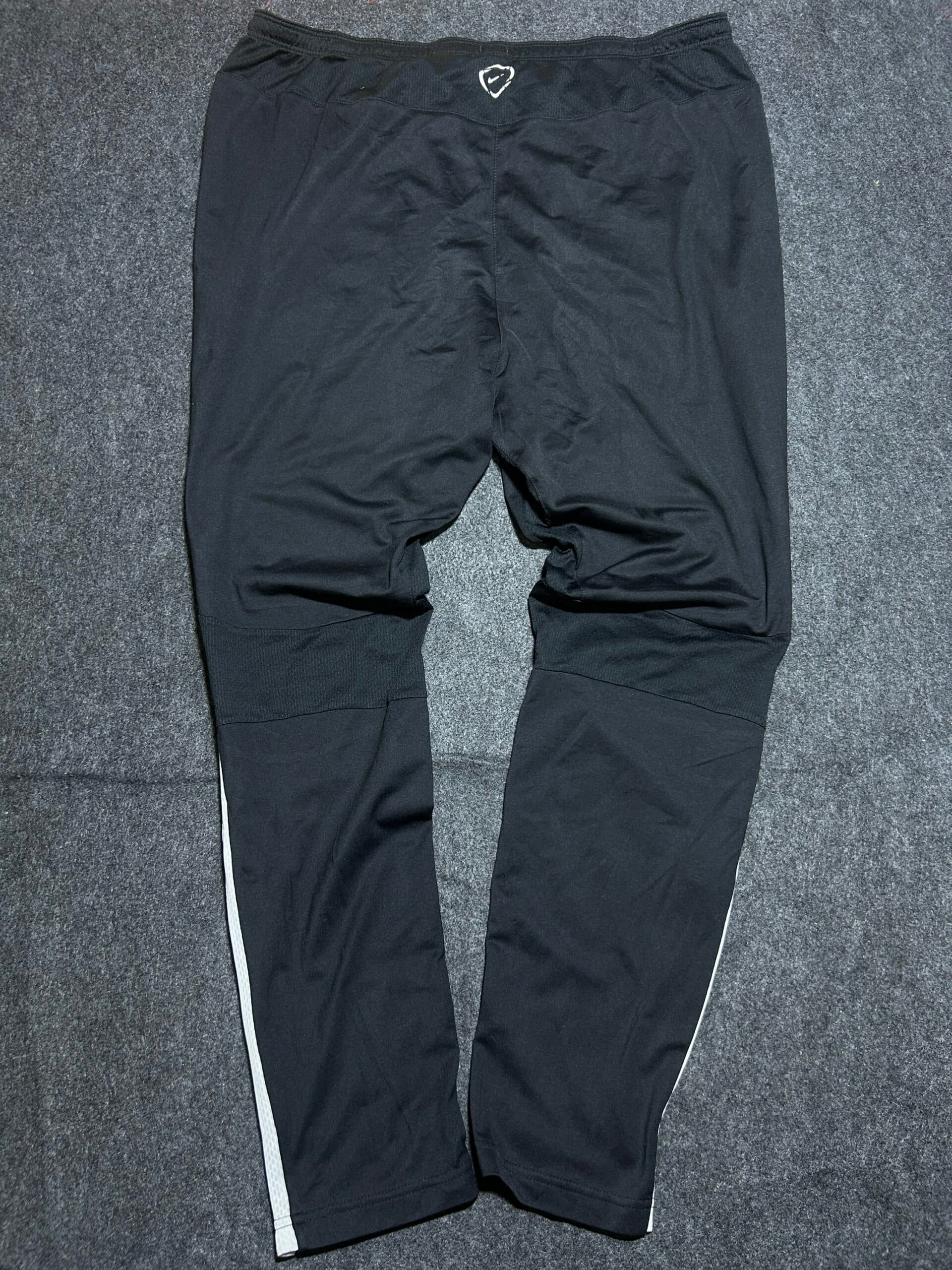 Nike Dri-FIT thrift track pants India back view