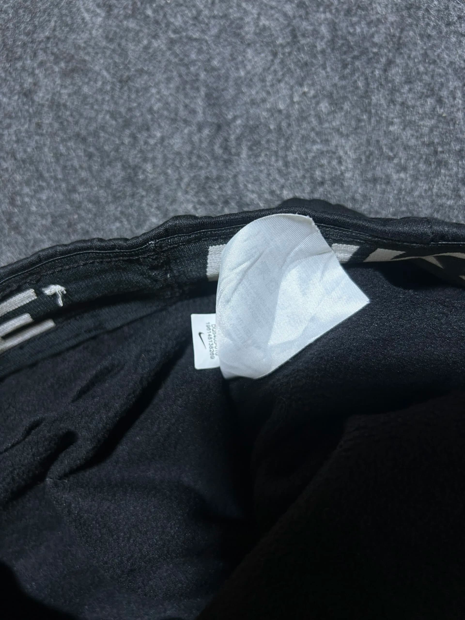 Nike thrift joggers India close-up