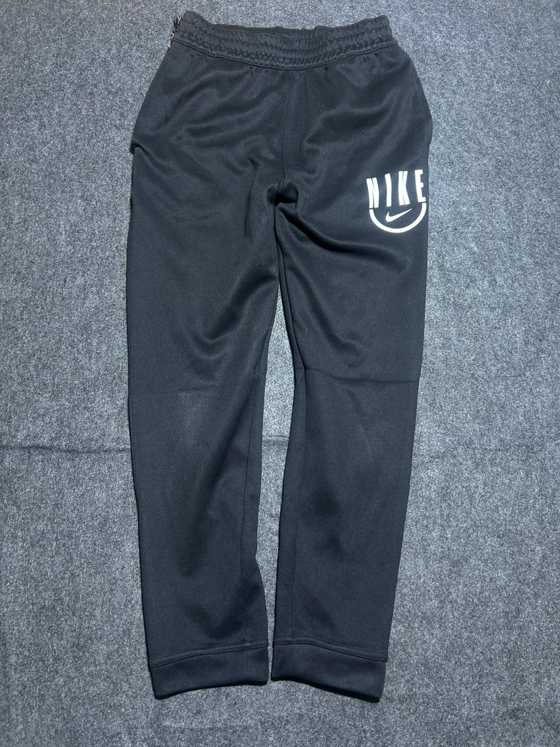 Nike Dri-FIT thrift track pants India back view
