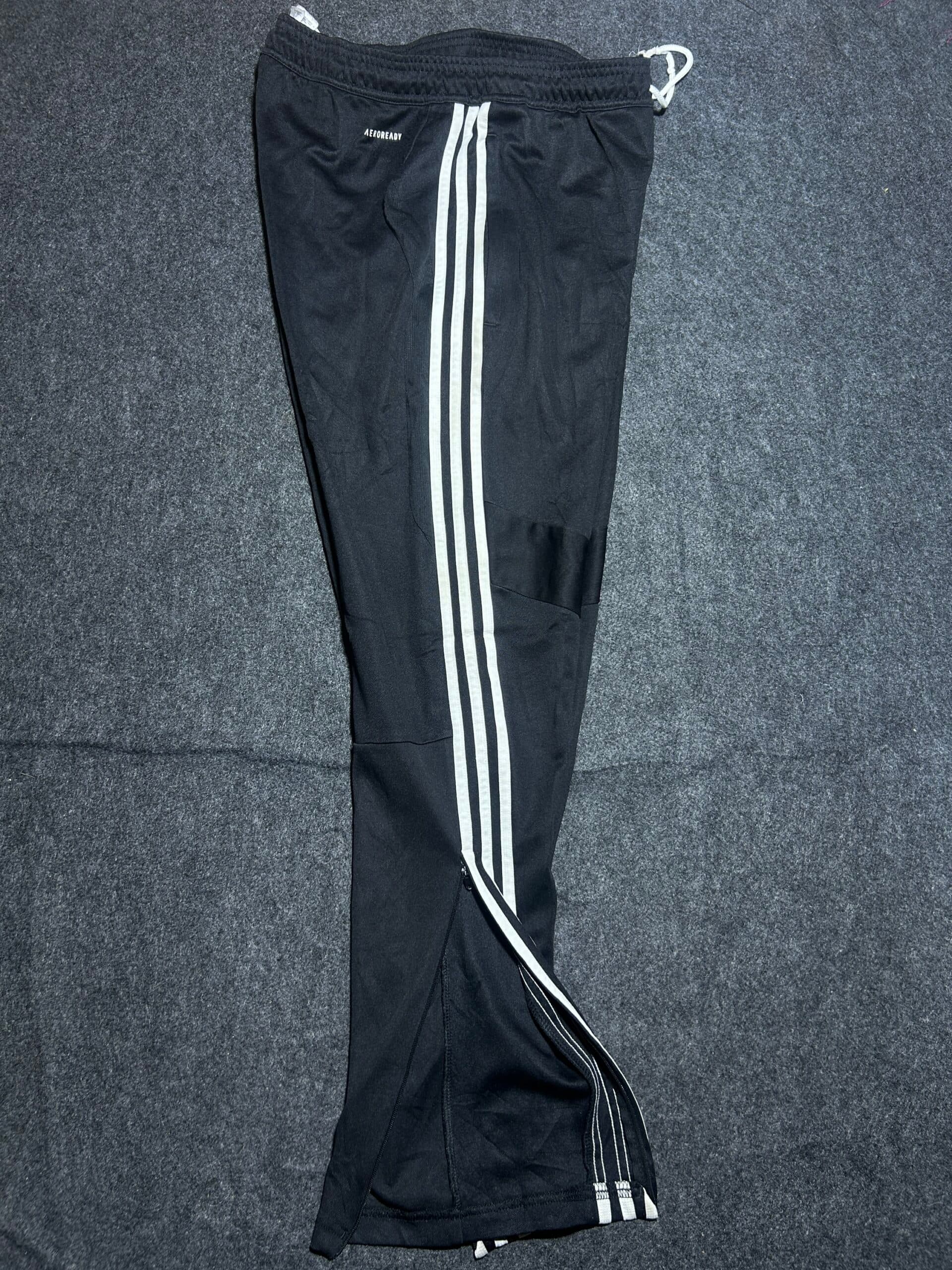 Adidas thrift track pants India close-up