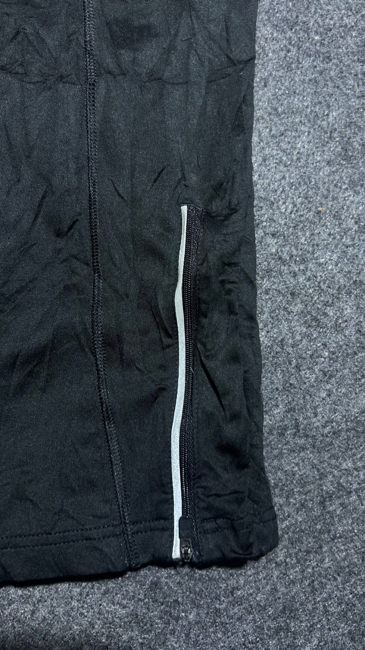 Adidas thrift track pants India close-up