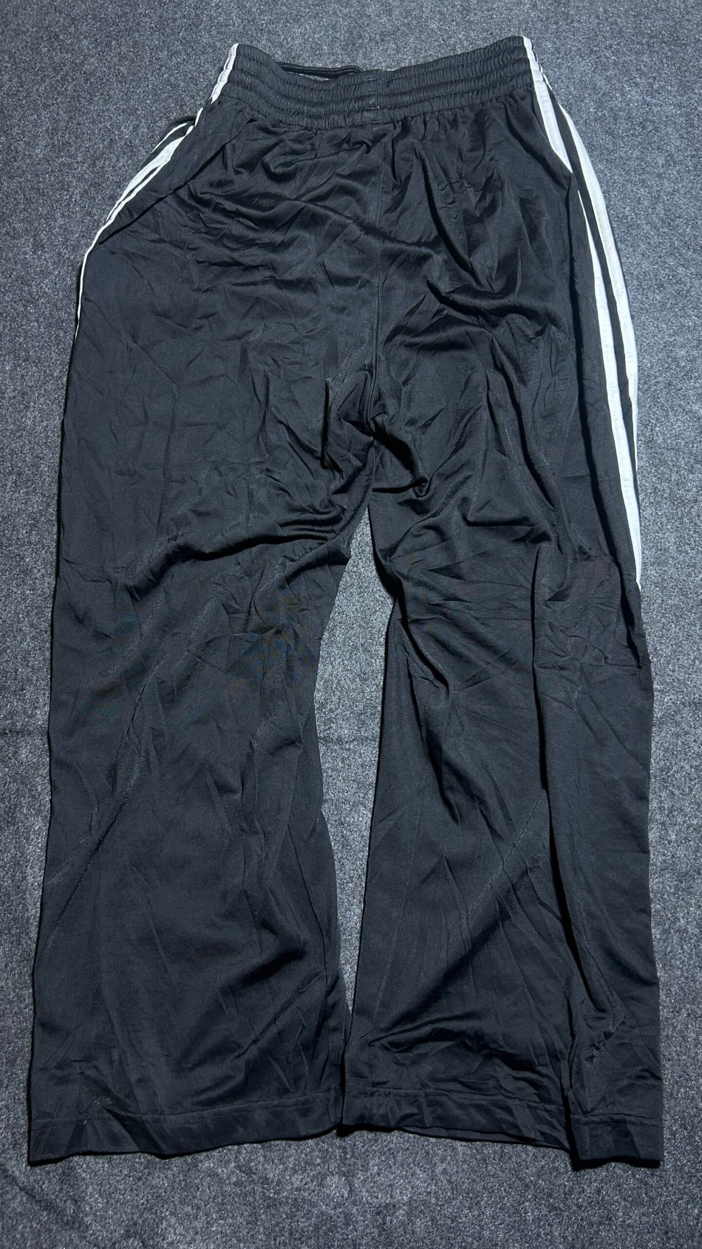 Adidas thrift track pants India close-up