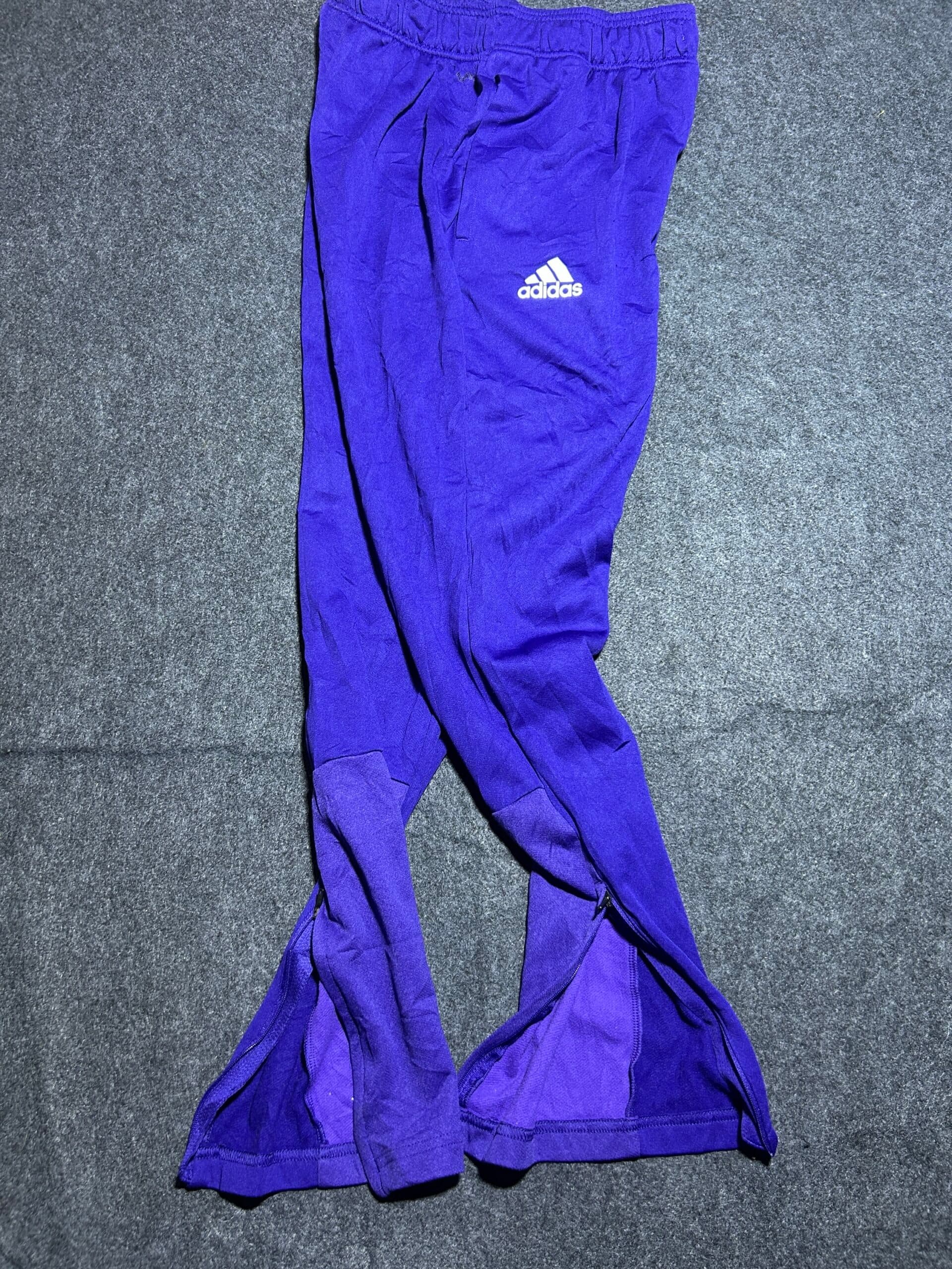 Adidas thrift track pants India close-up
