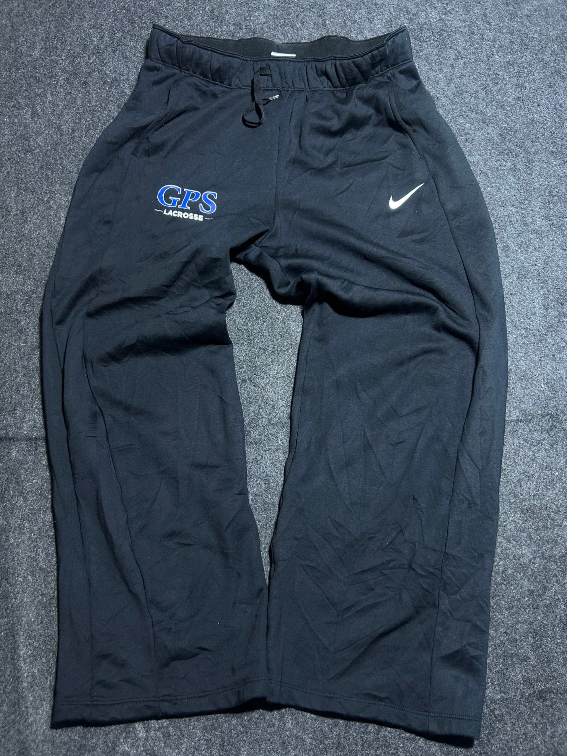 Nike thrift track pants India back view
